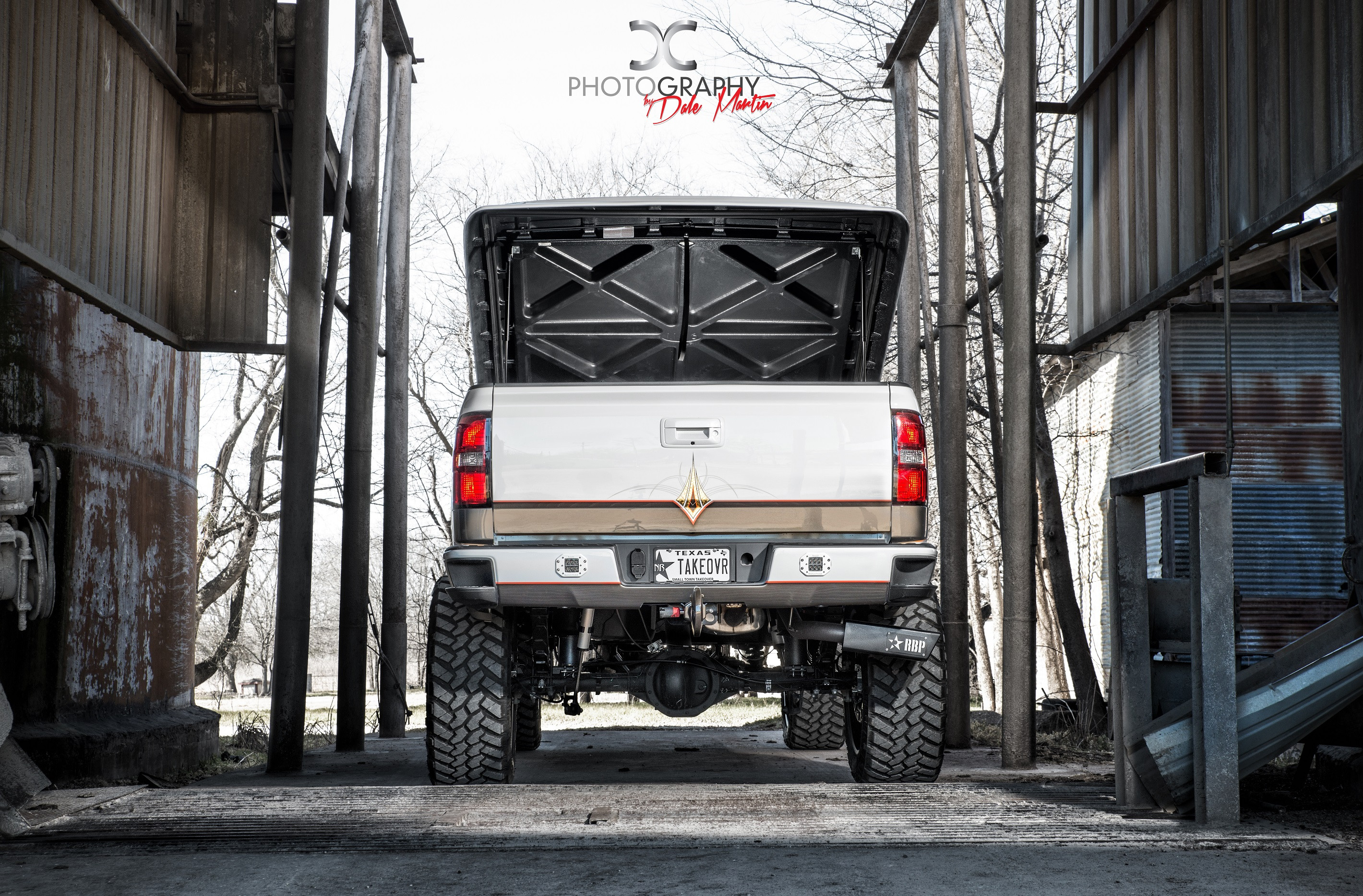 Lifted Gmc Sierra With Side Exit RBP tail Pipes - Photo by Dale Martin
