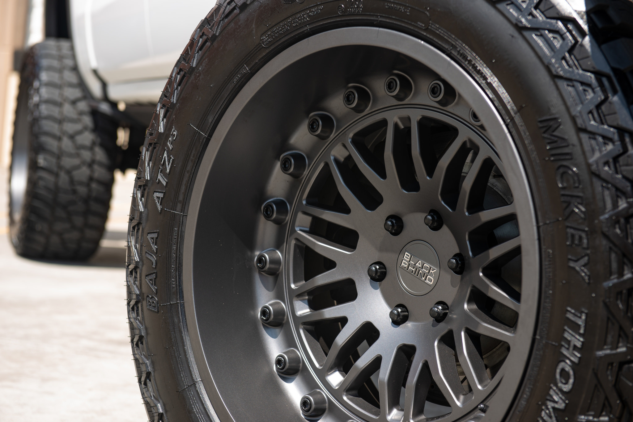 Custom Black Rhino Rims on White Lifted GMC Sierra - Photo by Black Rhino Wheels