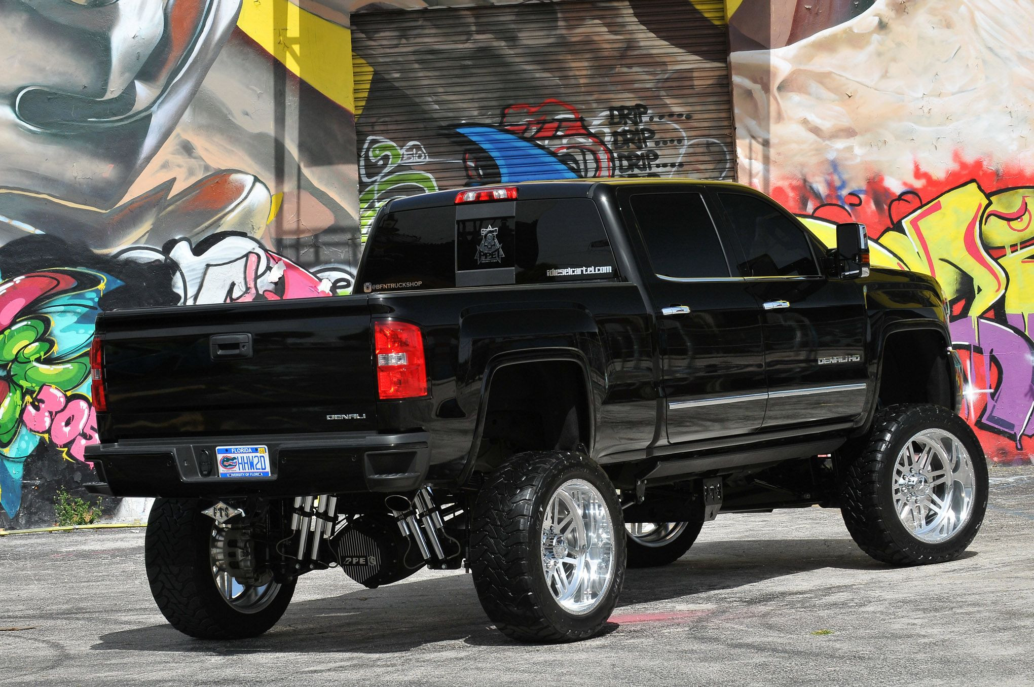 Red LED Taillights on Black Lifted GMC Sierra Denali - Photo by Phil Gordon