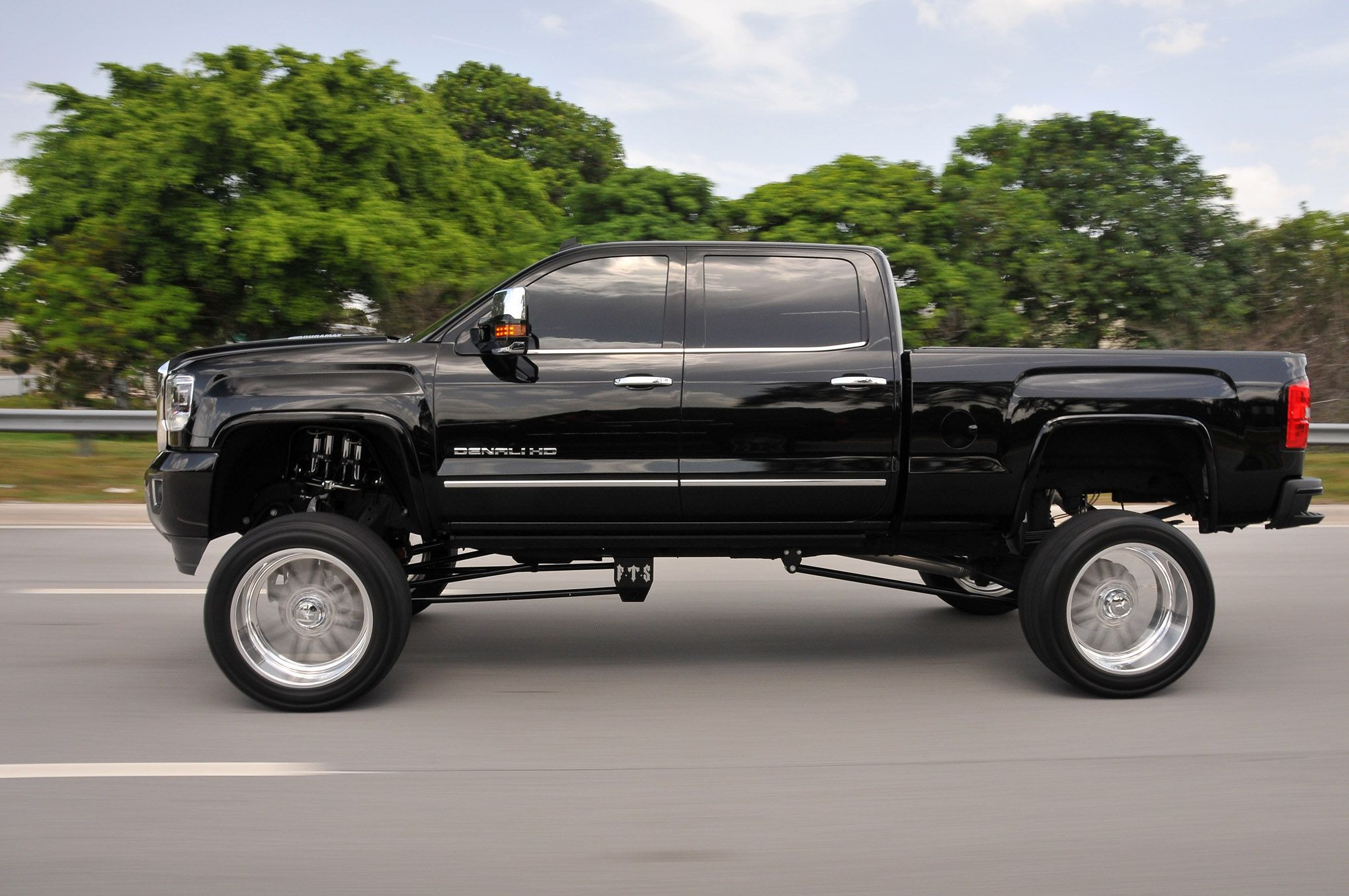 Aftermarket Side Mirrors on Black Lifted GMC Sierra Denali - Photo by Phil Gordon