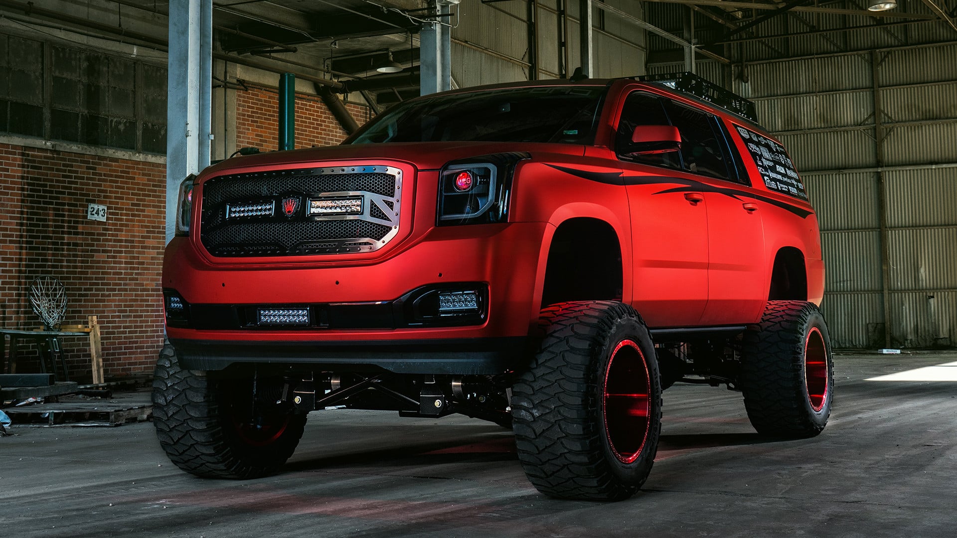 GMC Yukon with red Terminator style headlights - Photo by Dale Martin