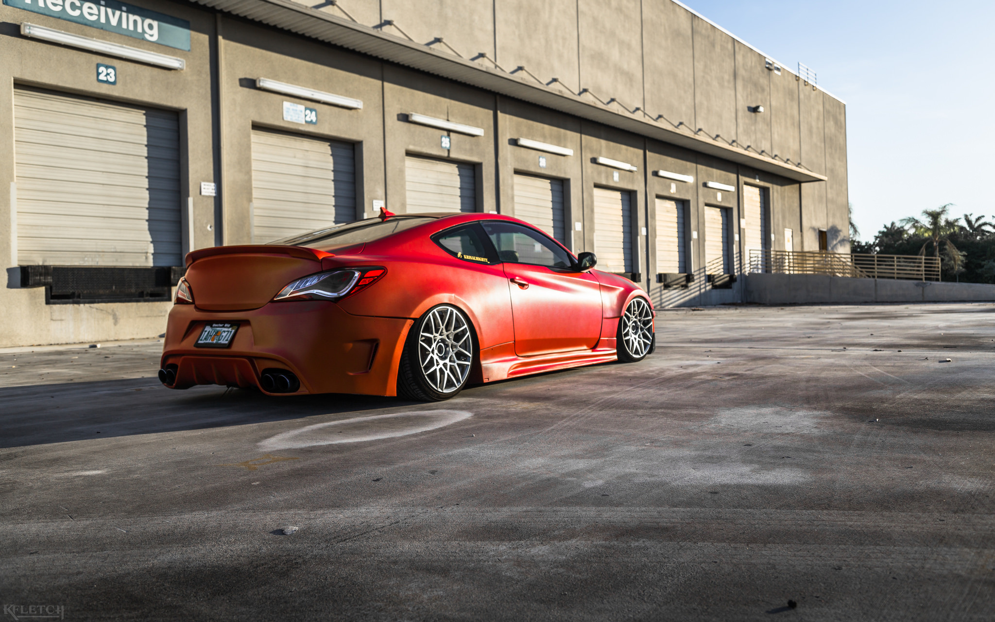 Red Hyundai Genesis Coupe with Dark Smoke Headlights - Photo by kyle Fletcher