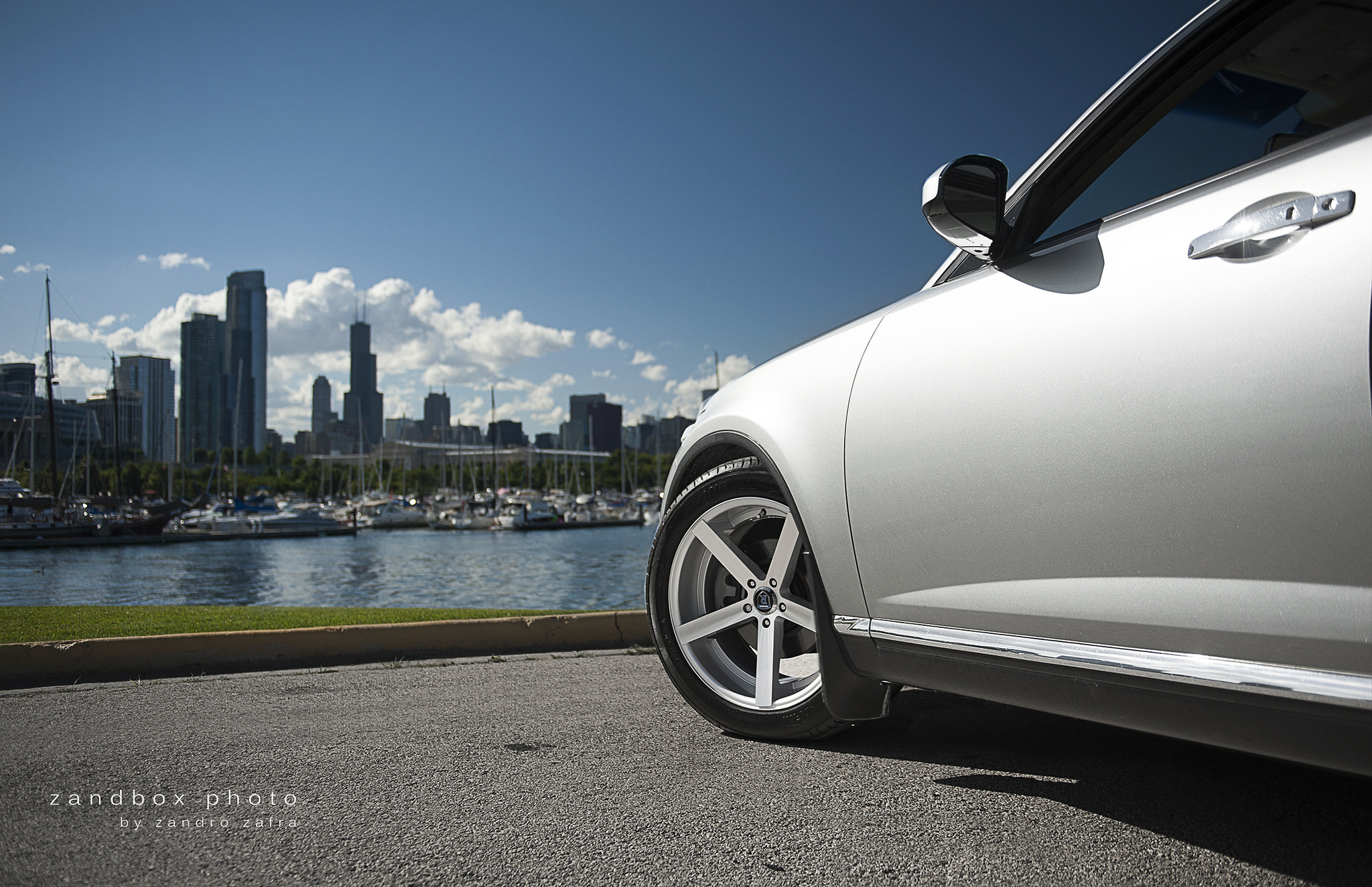 Silver Infiniti FX45 with Aftermarket Side Skirts  - Photo by zandbox