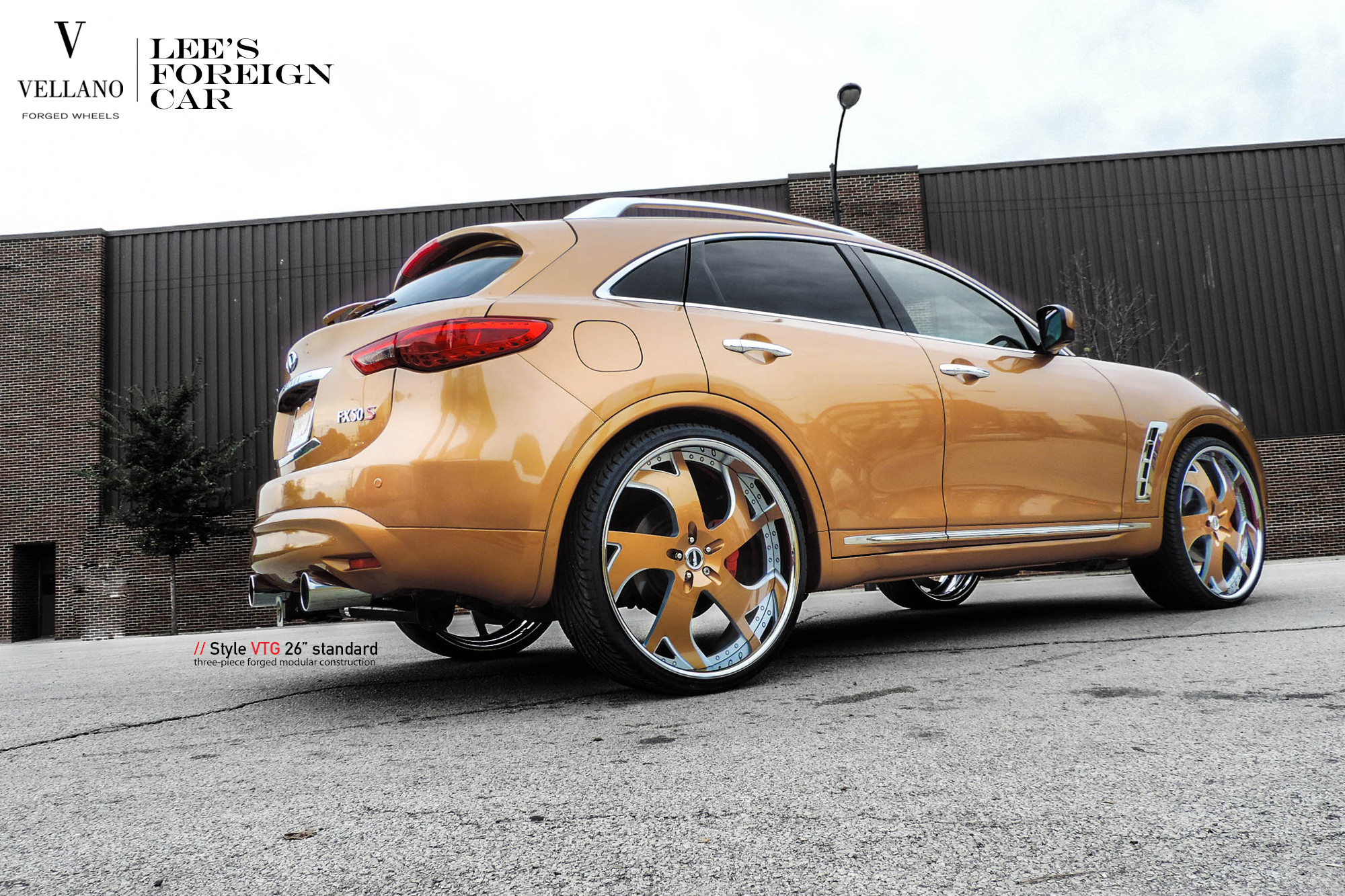 Roofline Spoiler with Light on Orange Jaguar FX50 - Photo by Vellano