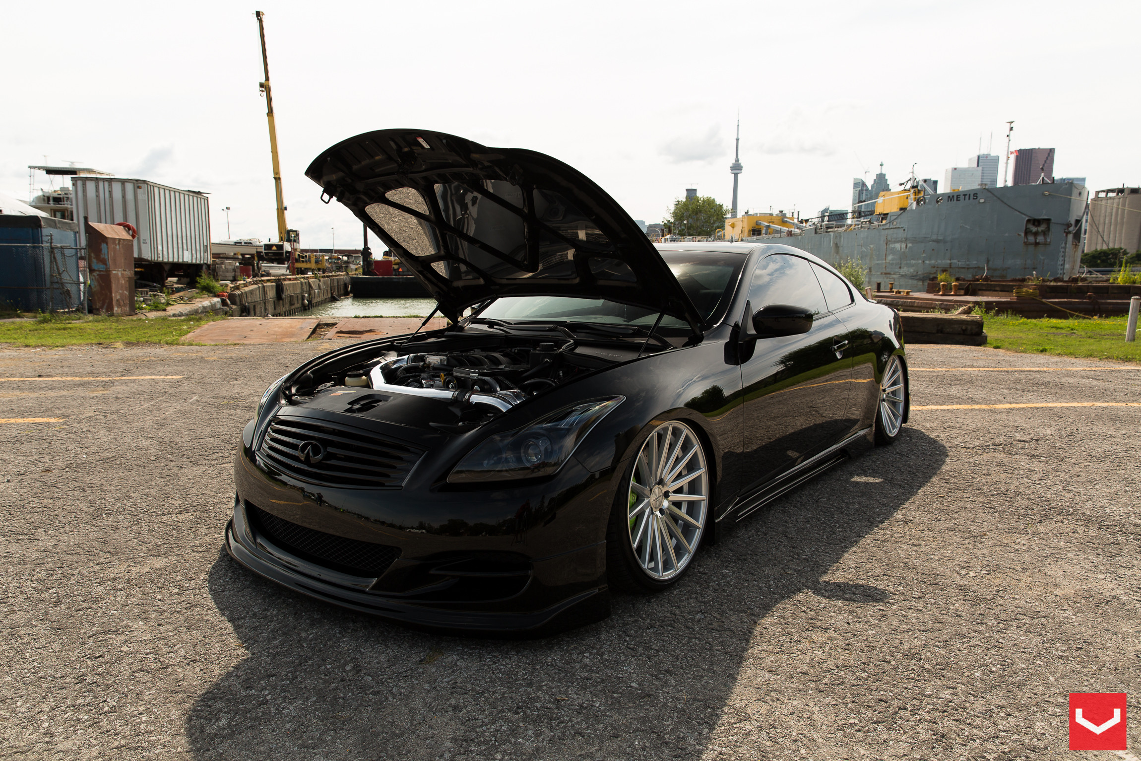 Chrome VFS Vossen Rims with Green Brakes on Infiniti G37 - Photo by Vossen