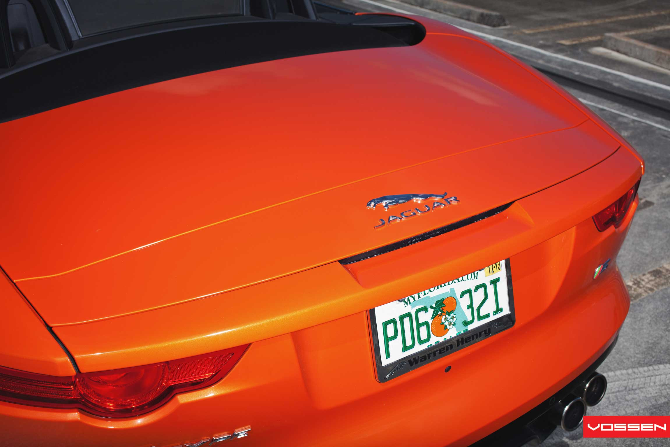 Orange Convertible Jaguar F-Type with Red Taillights - Photo by Vossen