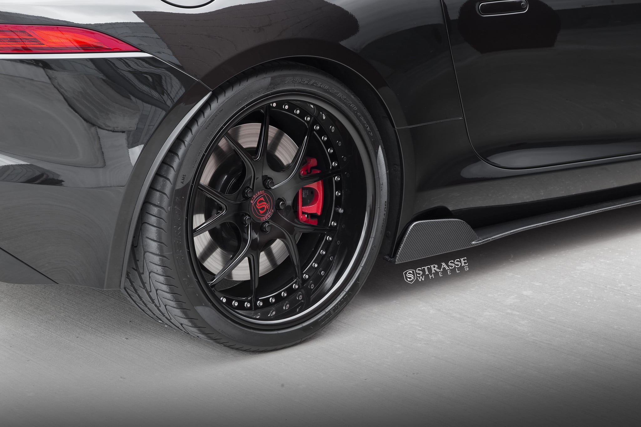 Pirelli Tires on Custom Black Jaguar F-Type - Photo by Strasse Forged