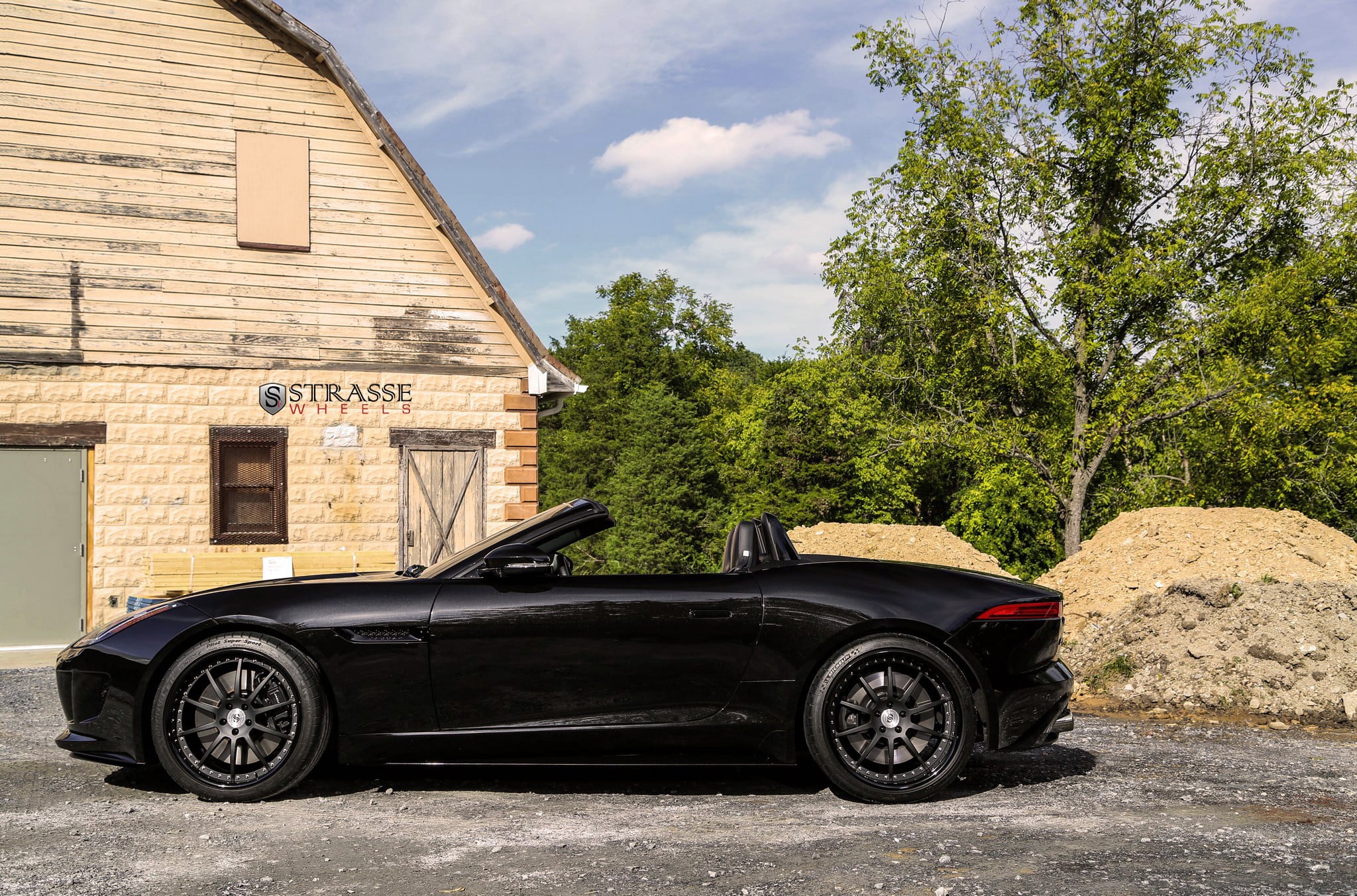 Matte Black Strasse Rims on Convertible Jaguar F-Type - Photo by Strasse Forged