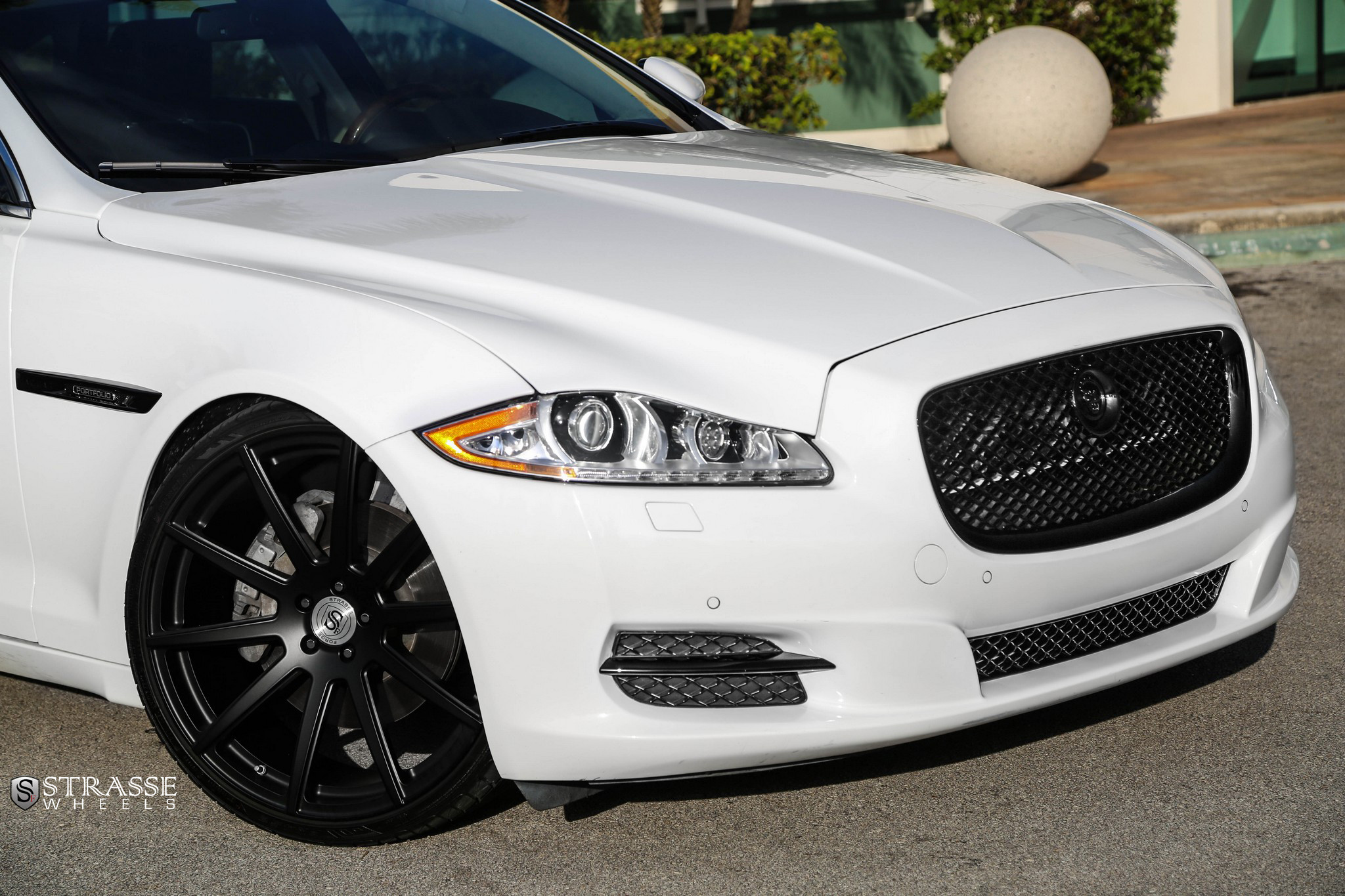 Matte Black Strasse Rims on White Jaguar XJ-Type - Photo by Strasse Forged