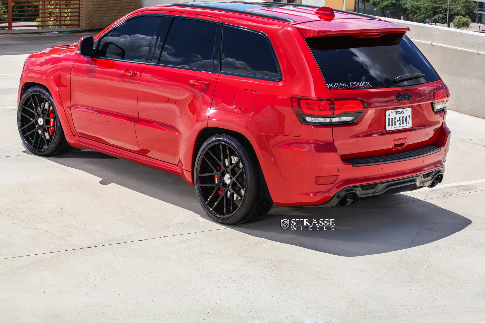 Red Jeep Grand Cherokee on Gloss Black Strasse Wheels Featuring Red ...