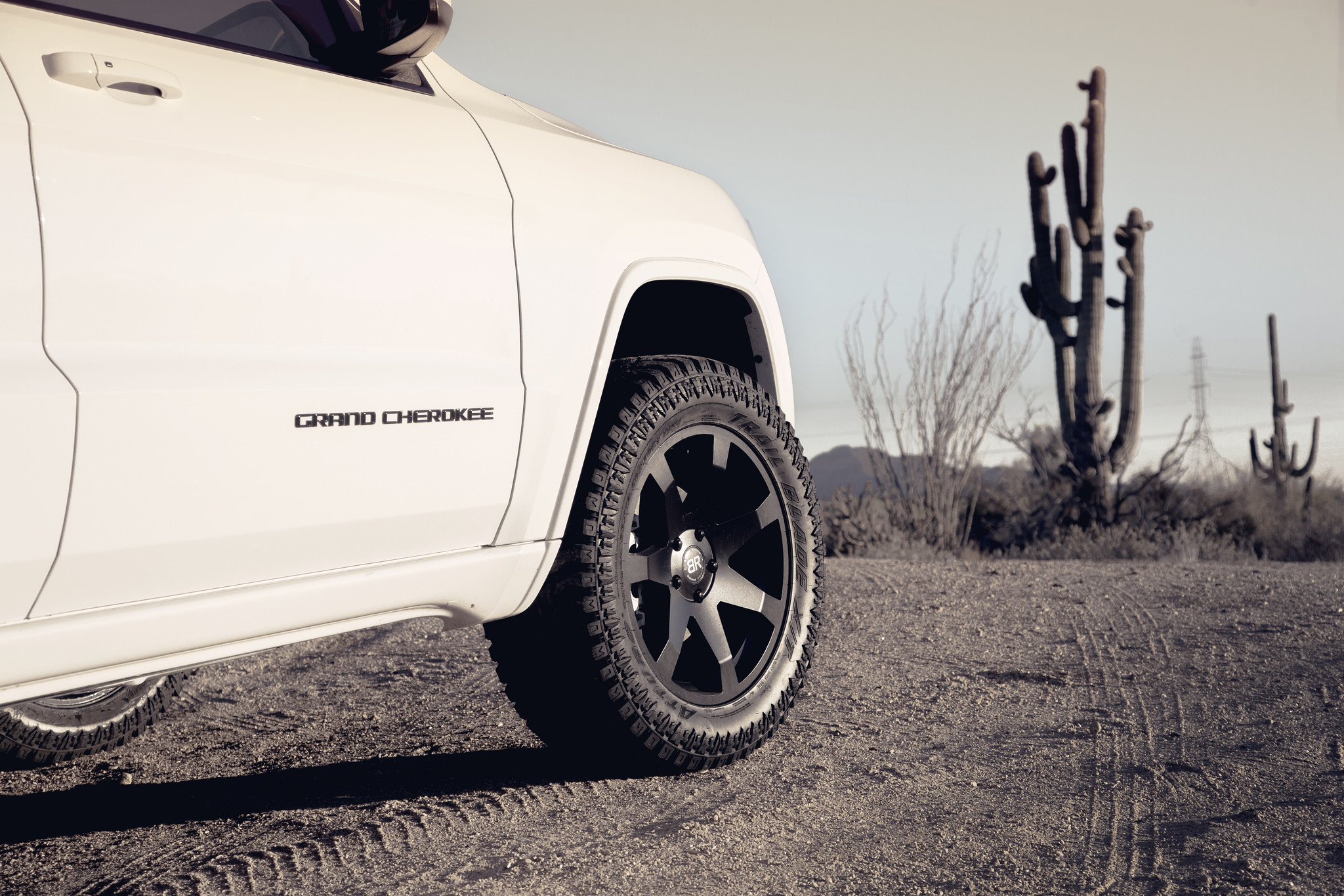 White Jeep Grand Cherokee on Black Off-road Wheels - Photo by Black Rhino