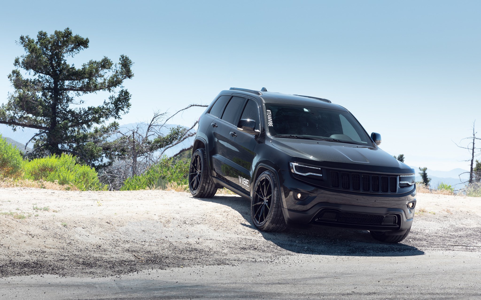 Blacked Out Jeep Grand Cherokee Gets Plenty of Attention with Custom Wheels  | CARiD.com Gallery, image size:2048x1280