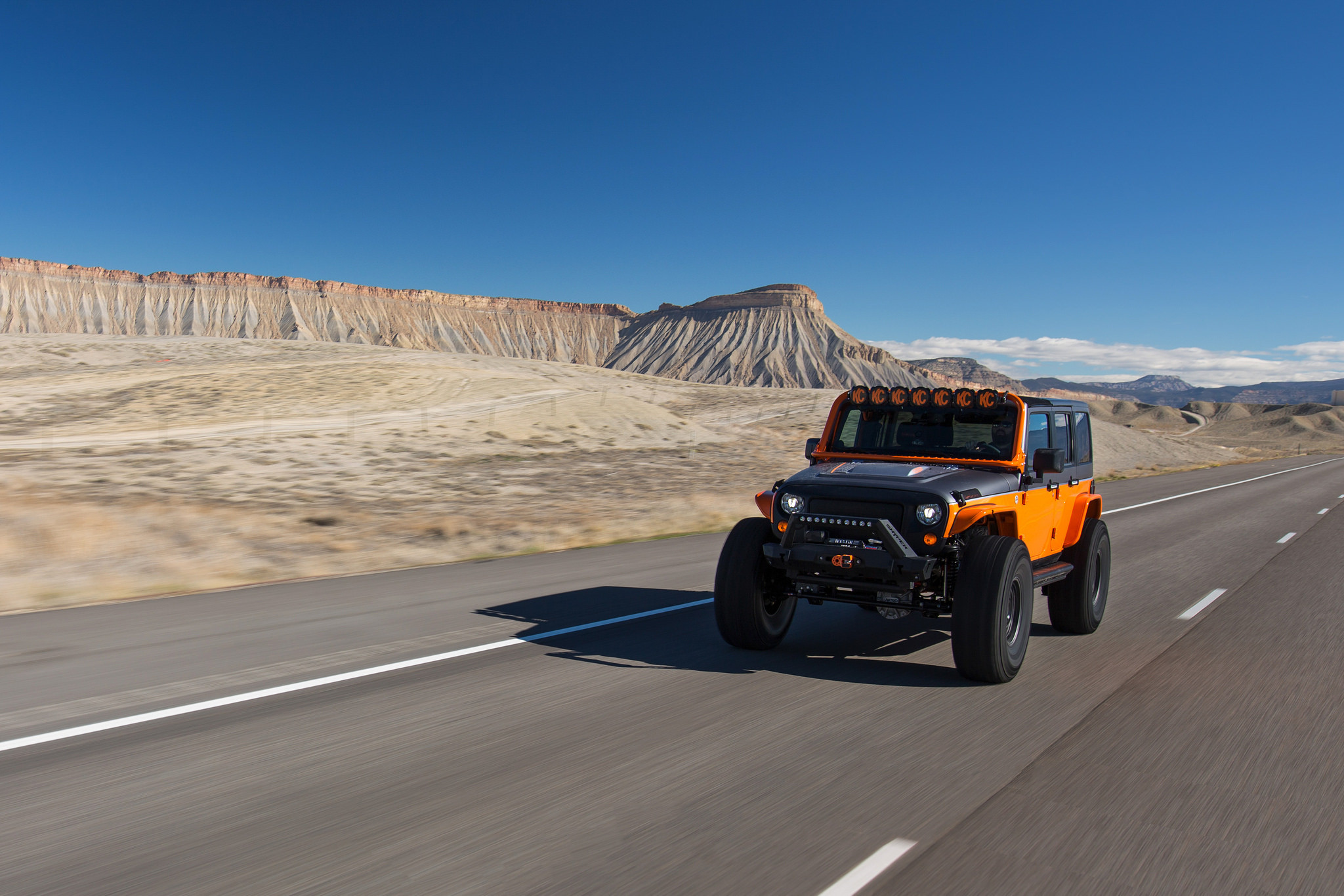 Orange Jeep Wrangler with Custom Hood - Photo by Black Rhino