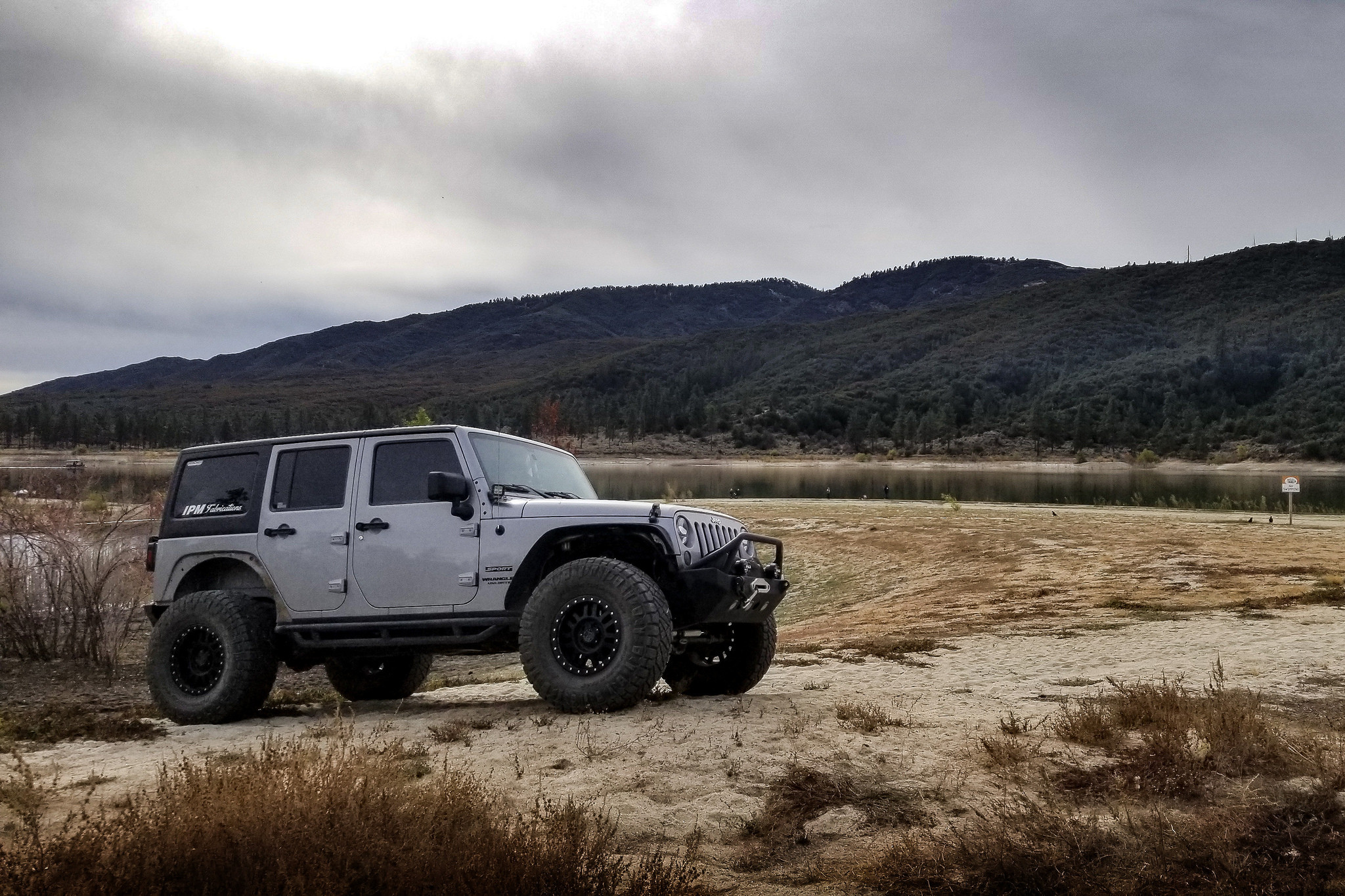 Custom Nerf Steps on Gray Jeep Wrangler - Photo by Black Rhino