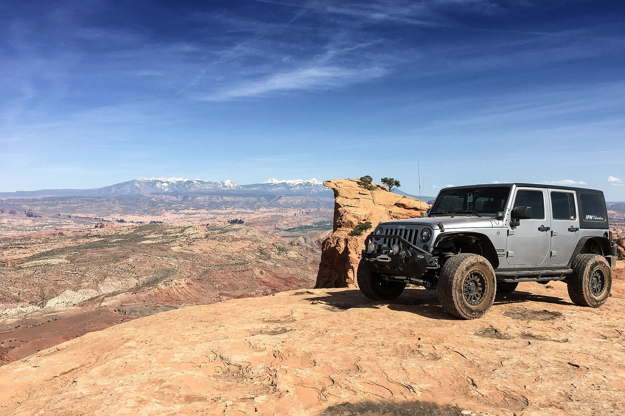 Gray Lifted Jeep Wrangler with Dark Smoke Headlights - Photo by Black Rhino