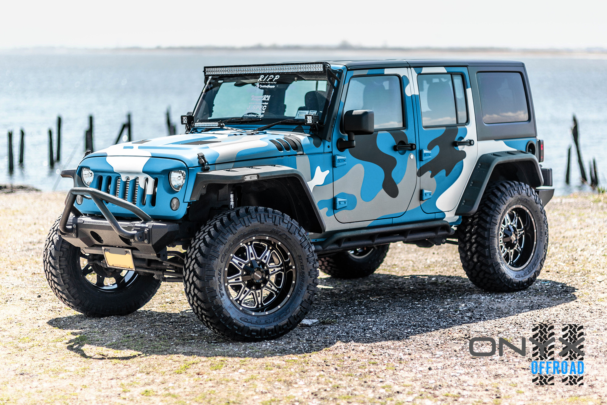 Camo Painted Jeep Wrangler with Custom Vented Hood - Photo by Onyx Offroad