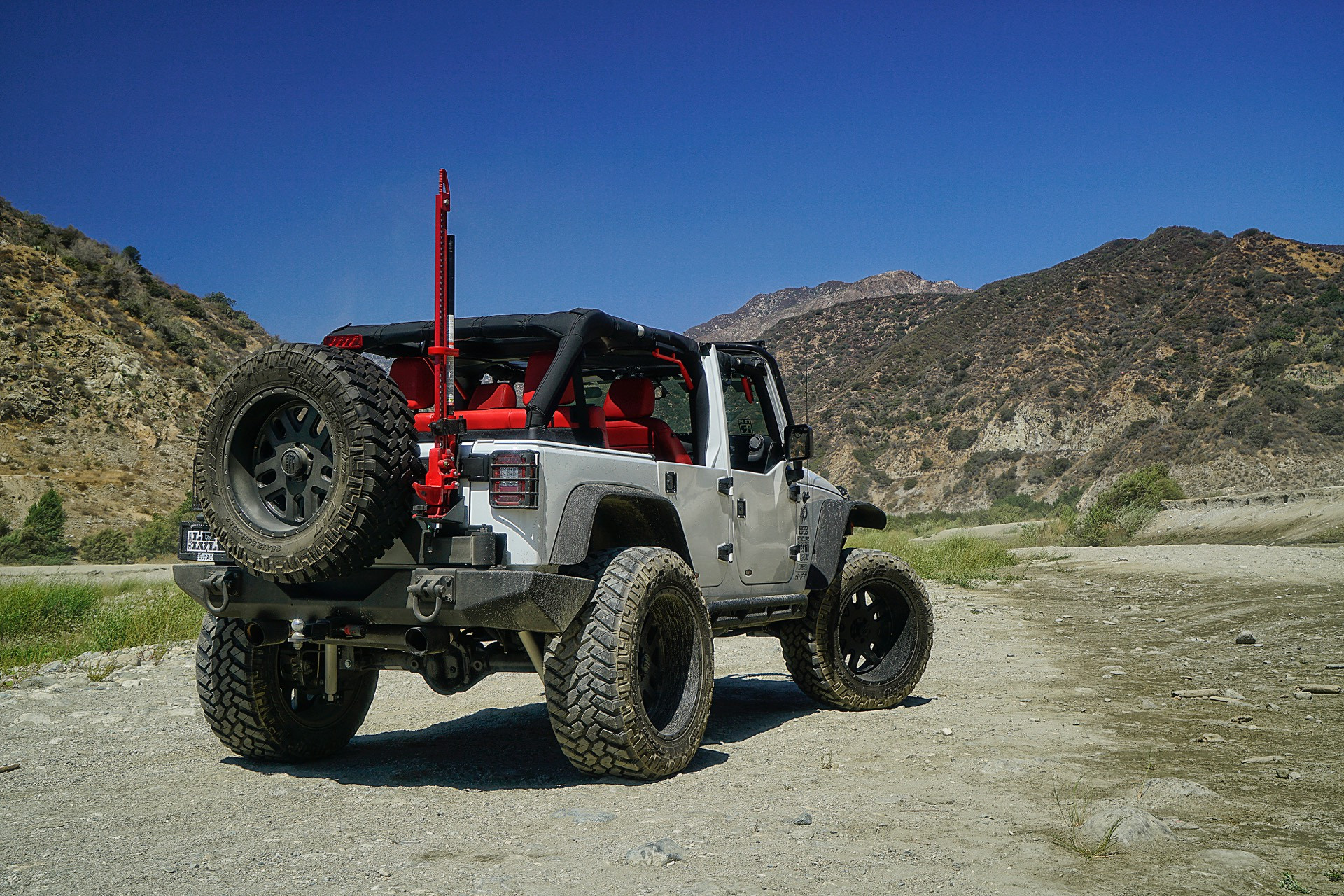 Gray Jeep Wrangler with Custom Soft Top - Photo by TIS Wheels