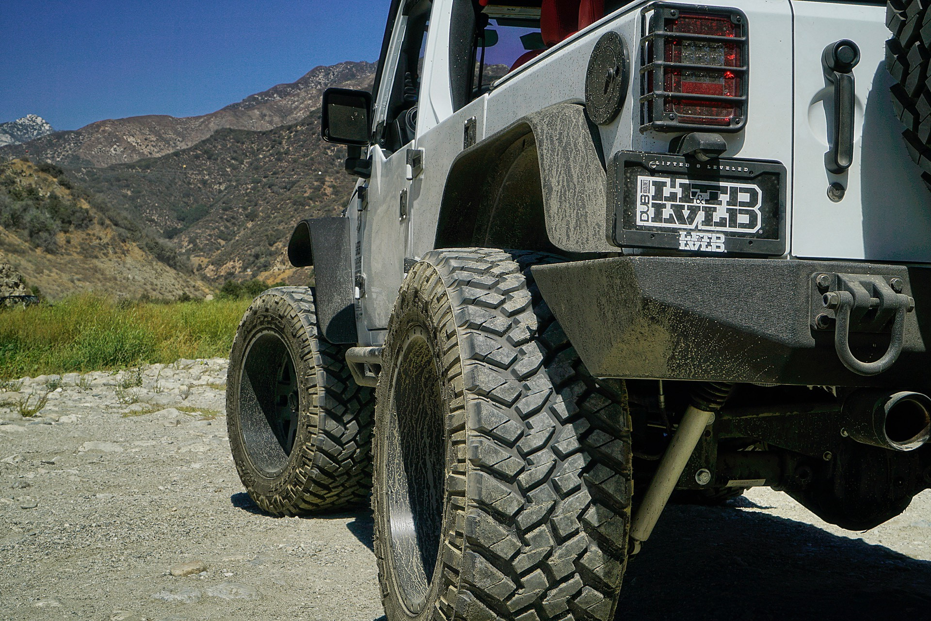 Rear Bumper with Tow Hooks on Gray Jeep Wrangler - Photo by TIS Wheels