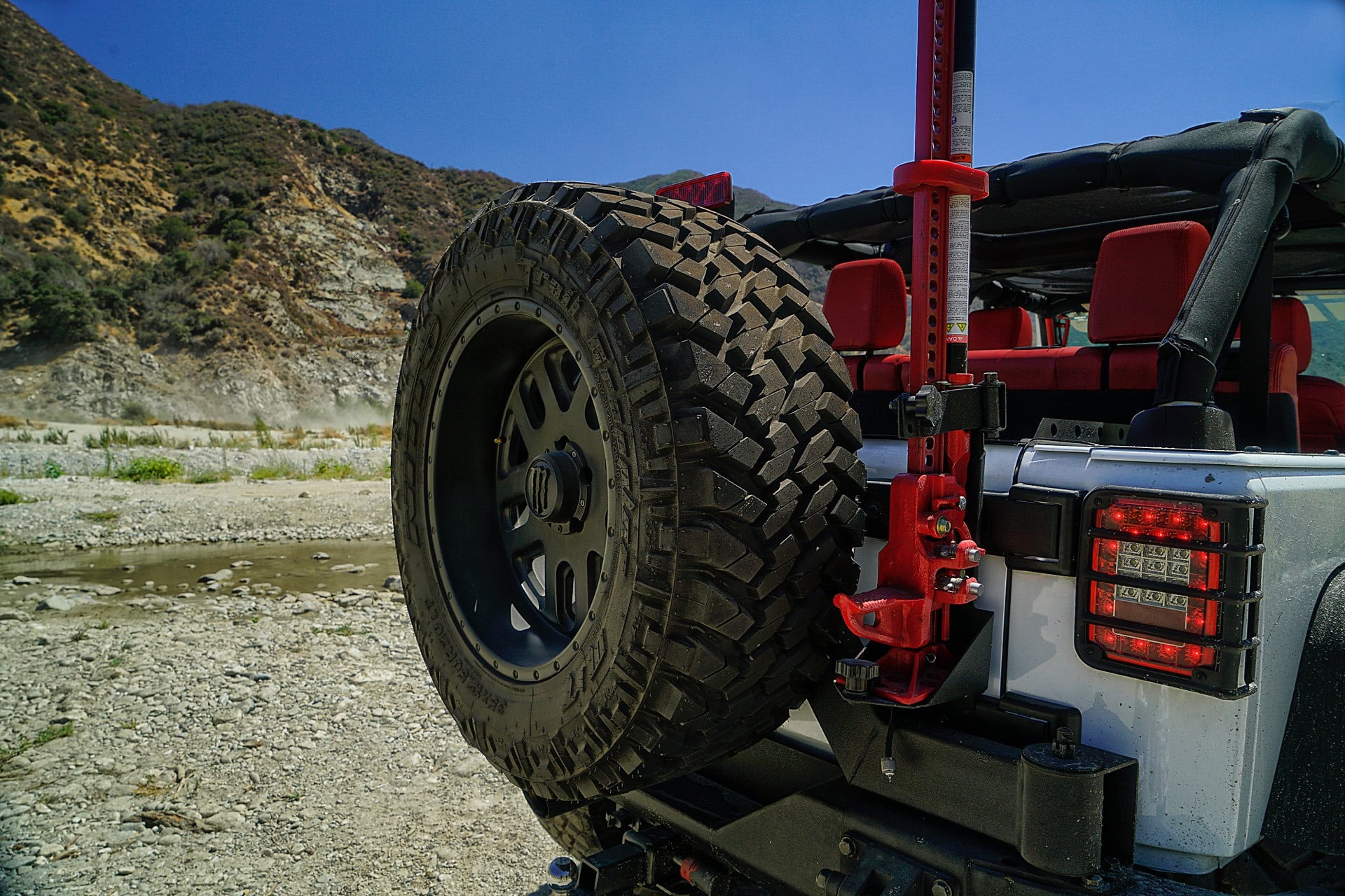 Gray Jeep Wrangler with Aftermarket LED Taillights - Photo by TIS Wheels