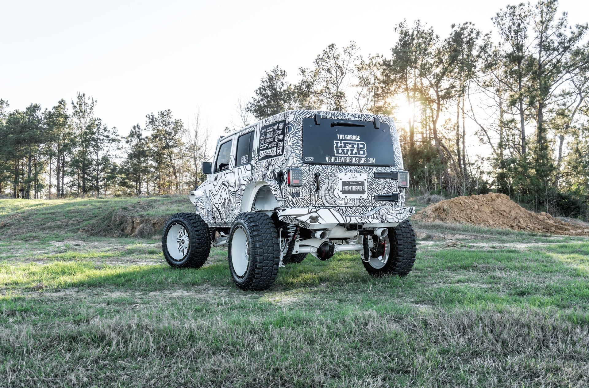 White Lifted Jeep Wrangler with MBRP Exhaust System - Photo by TIS Wheels