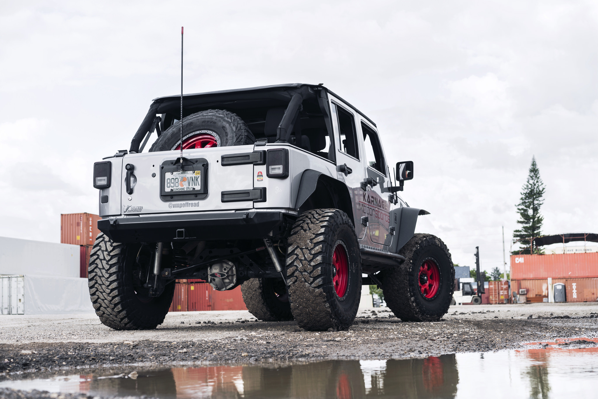 Custom Built JK with Stinger Bumper and Red Fuel Wheels - Photo by Fuel Off-Road