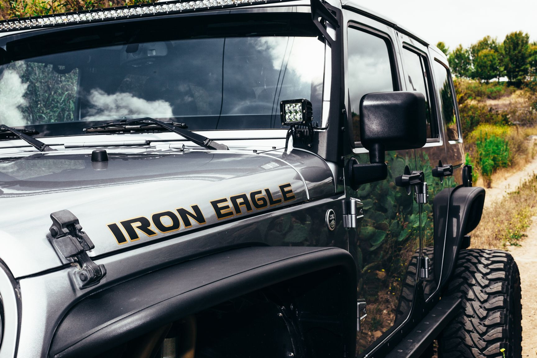 Off-Road Auxiliary LED Lights on Gray Lifted Jeep Wrangler - Photo by Rebel Off-Road