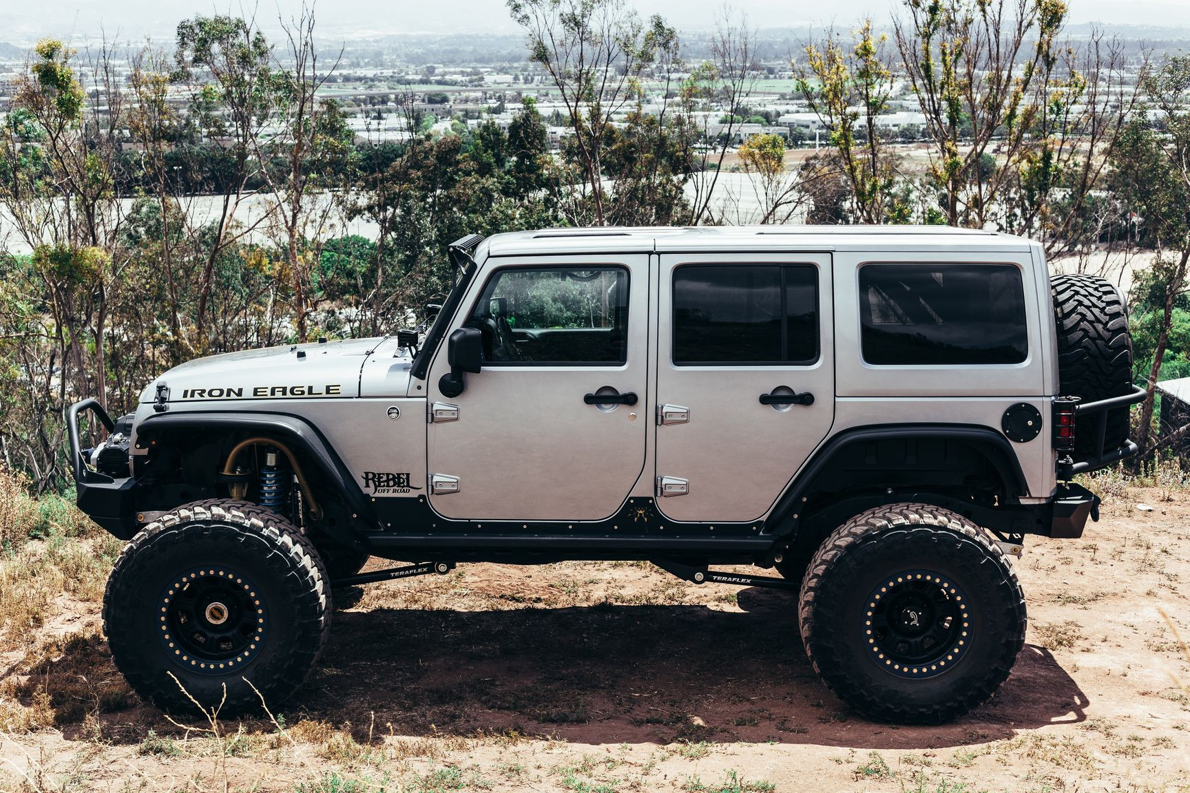 Gray Lifted Jeep Wrangler with Toyo Tires - Photo by Rebel Off-Road
