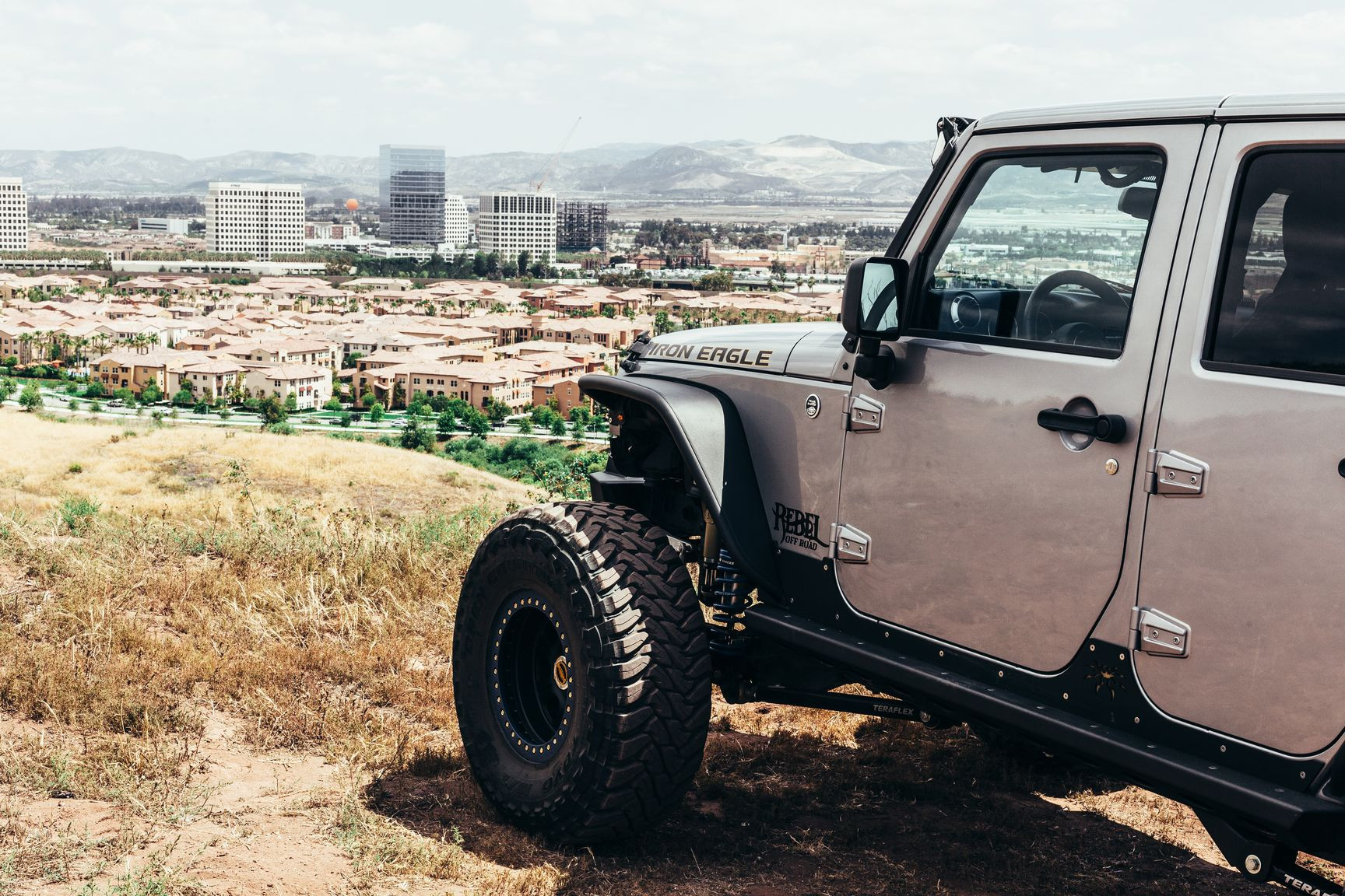 Custom Lift Kit on Gray Lifted Jeep Wrangler - Photo by Rebel Off-Road