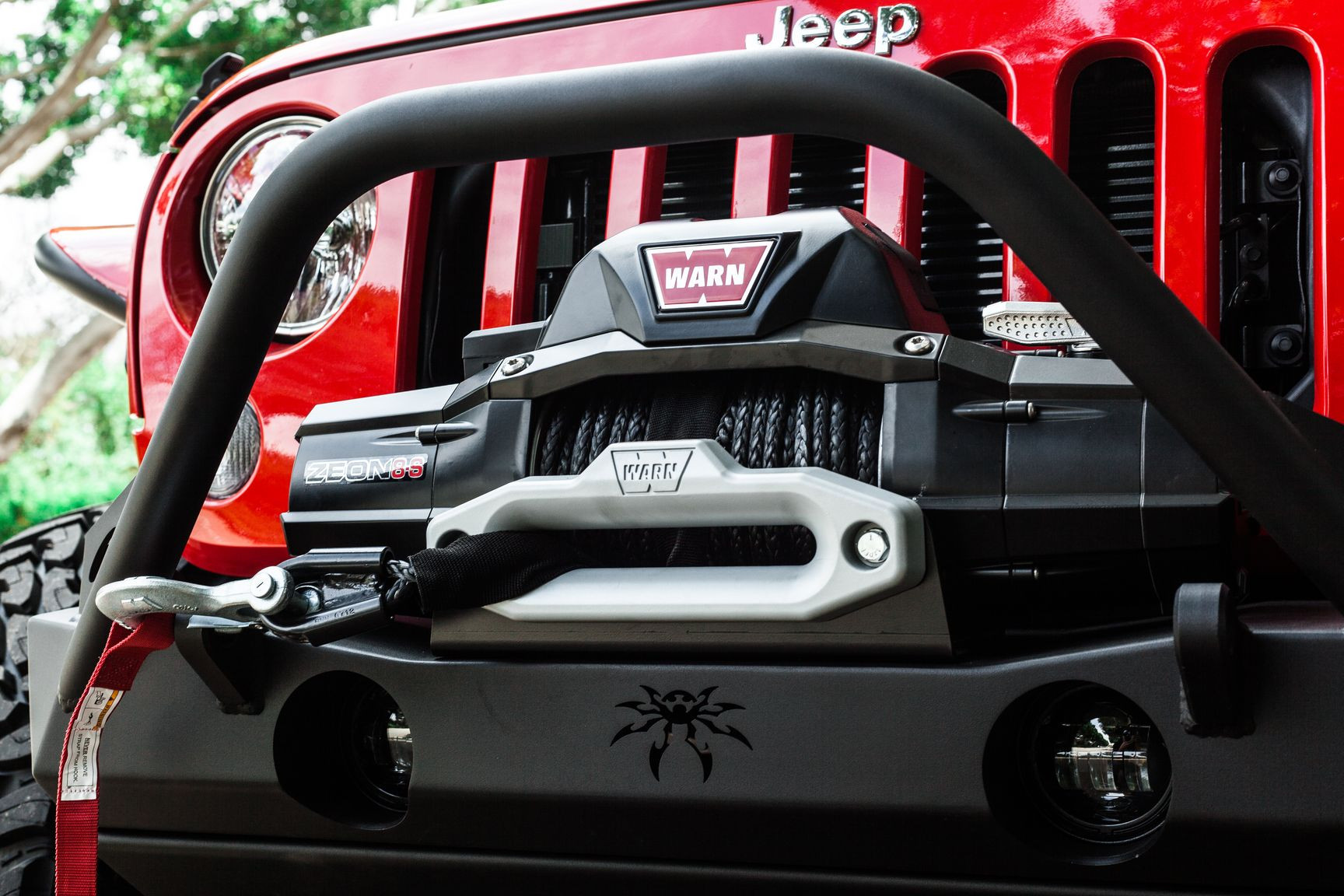 Warn Zeon 8S Winch on Red Jeep Wrangler Rubicon - Photo by Rebel Off-Road