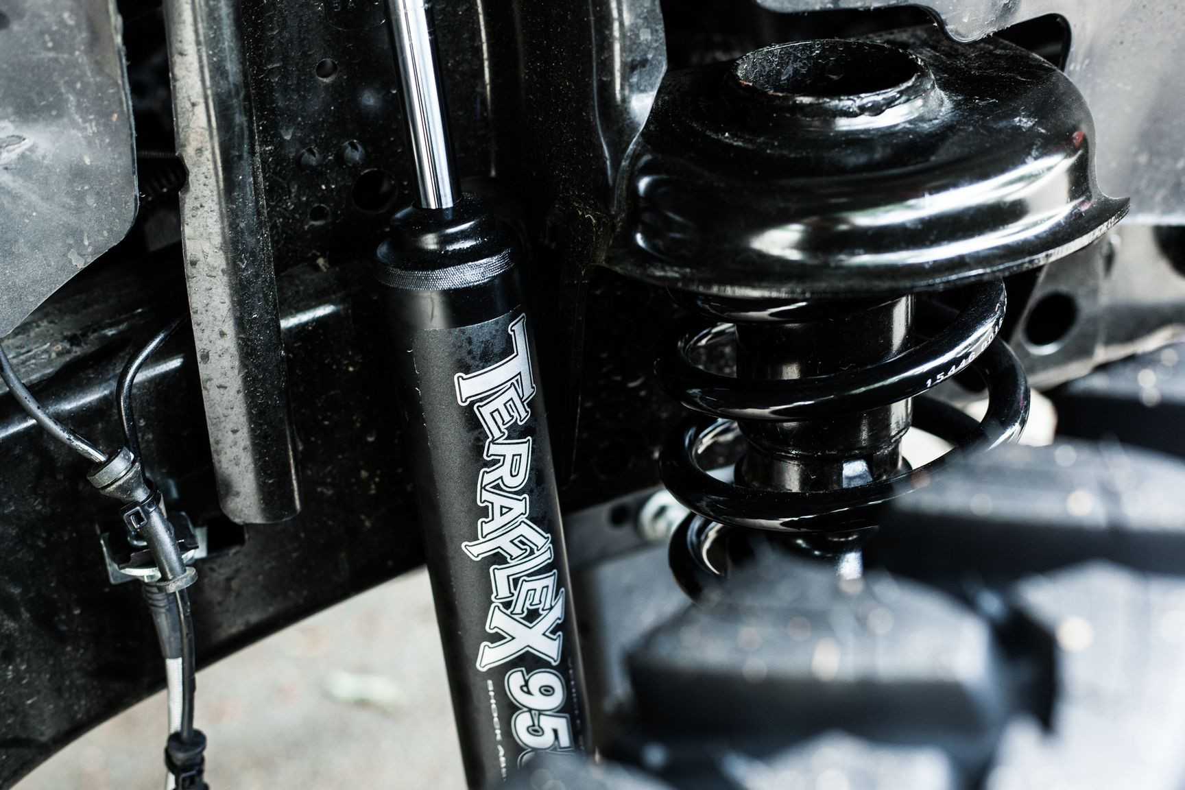 TeraFlex Suspension System on Red Jeep Wrangler Rubicon - Photo by Rebel Off-Road