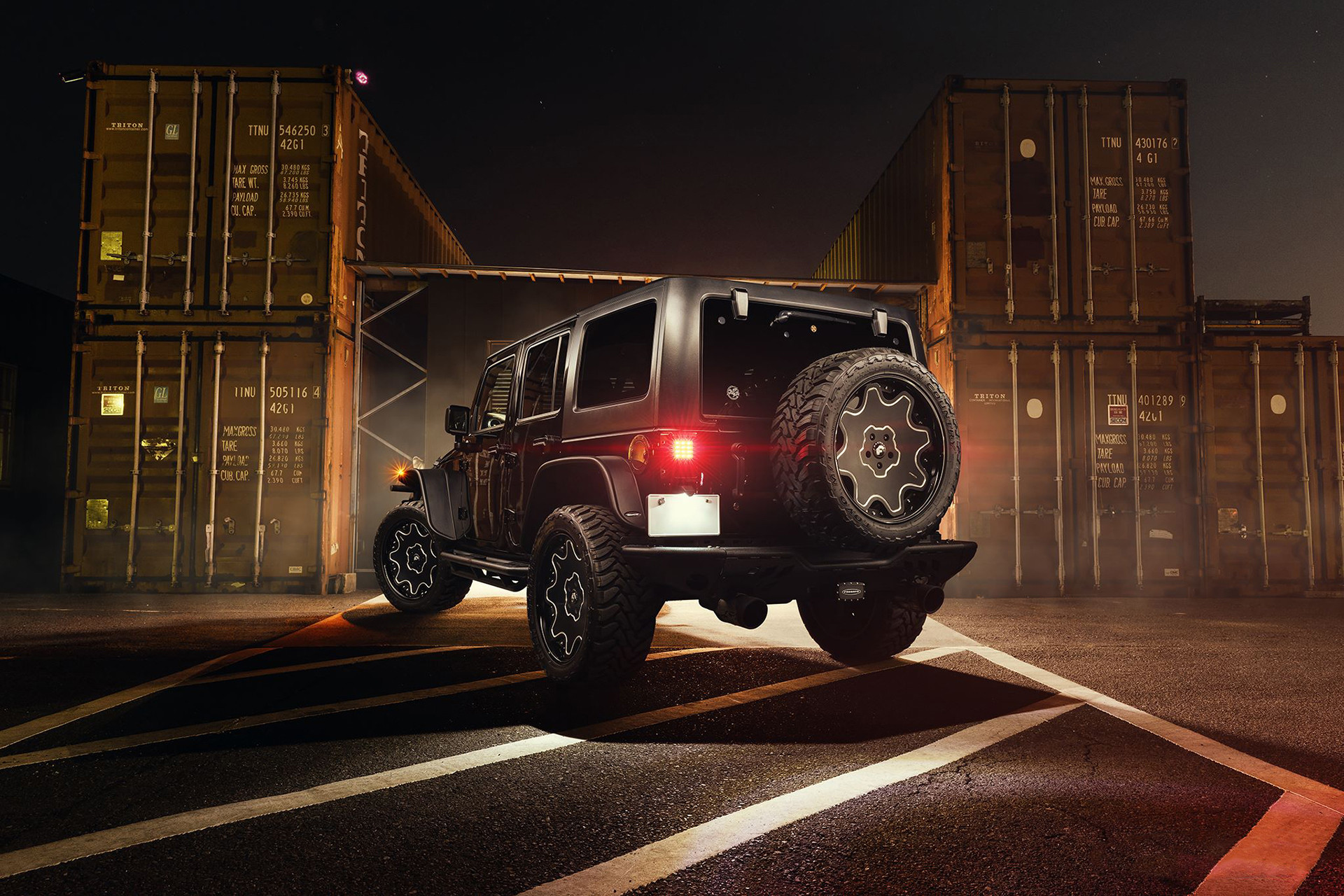 Custom Black Jeep Wrangler Spare Tire Kit - Photo by Forgiato