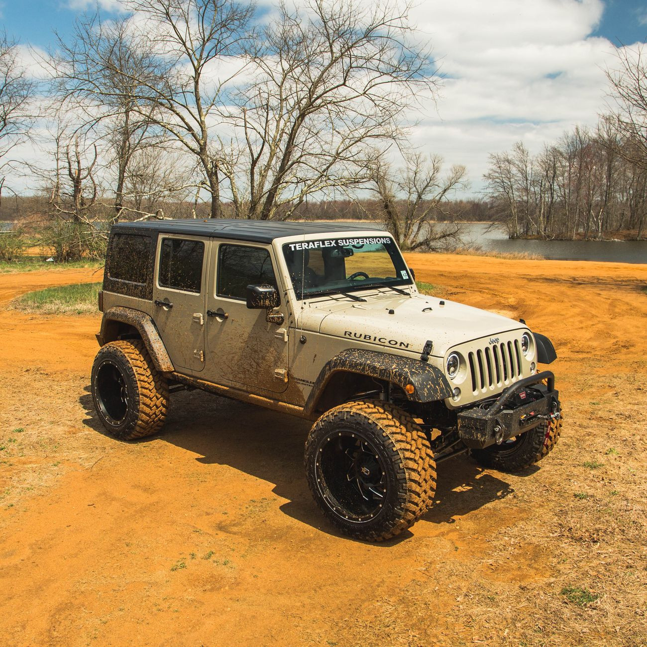 Beige Lifted Jeep Wrangler with Teraflex Suspension Kit - Photo by CARiD