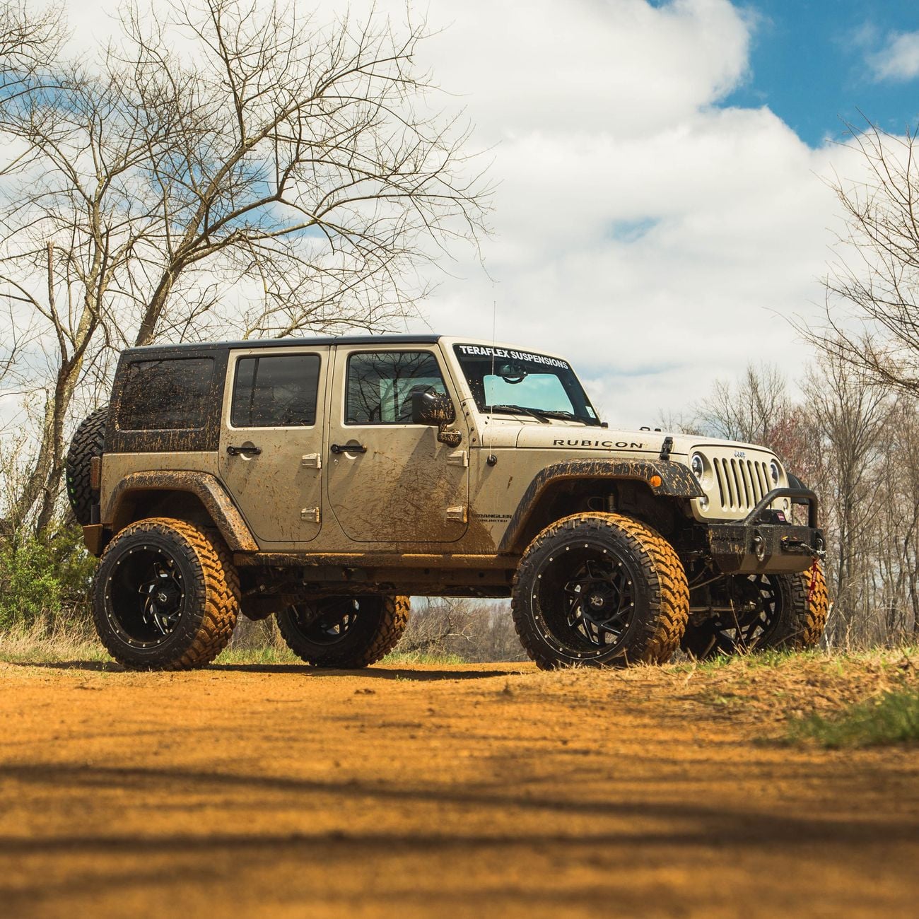 Dropstars Custom Wheels on Beige Lifted Jeep Wrangler - Photo by CARiD