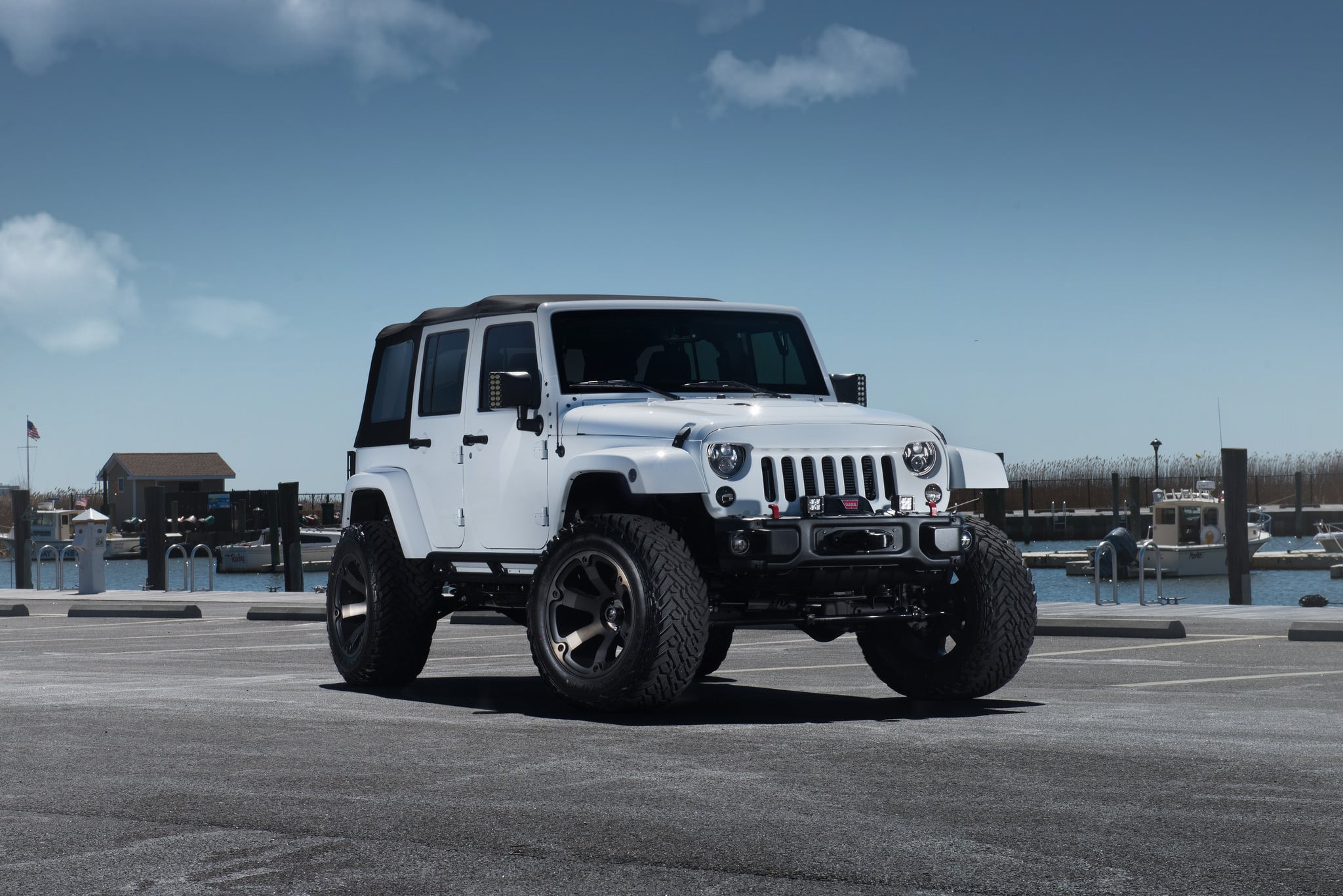 White Jeep Wrangler Unlimited on 35 Inch Wheels - Photo by Fuel Off-Road