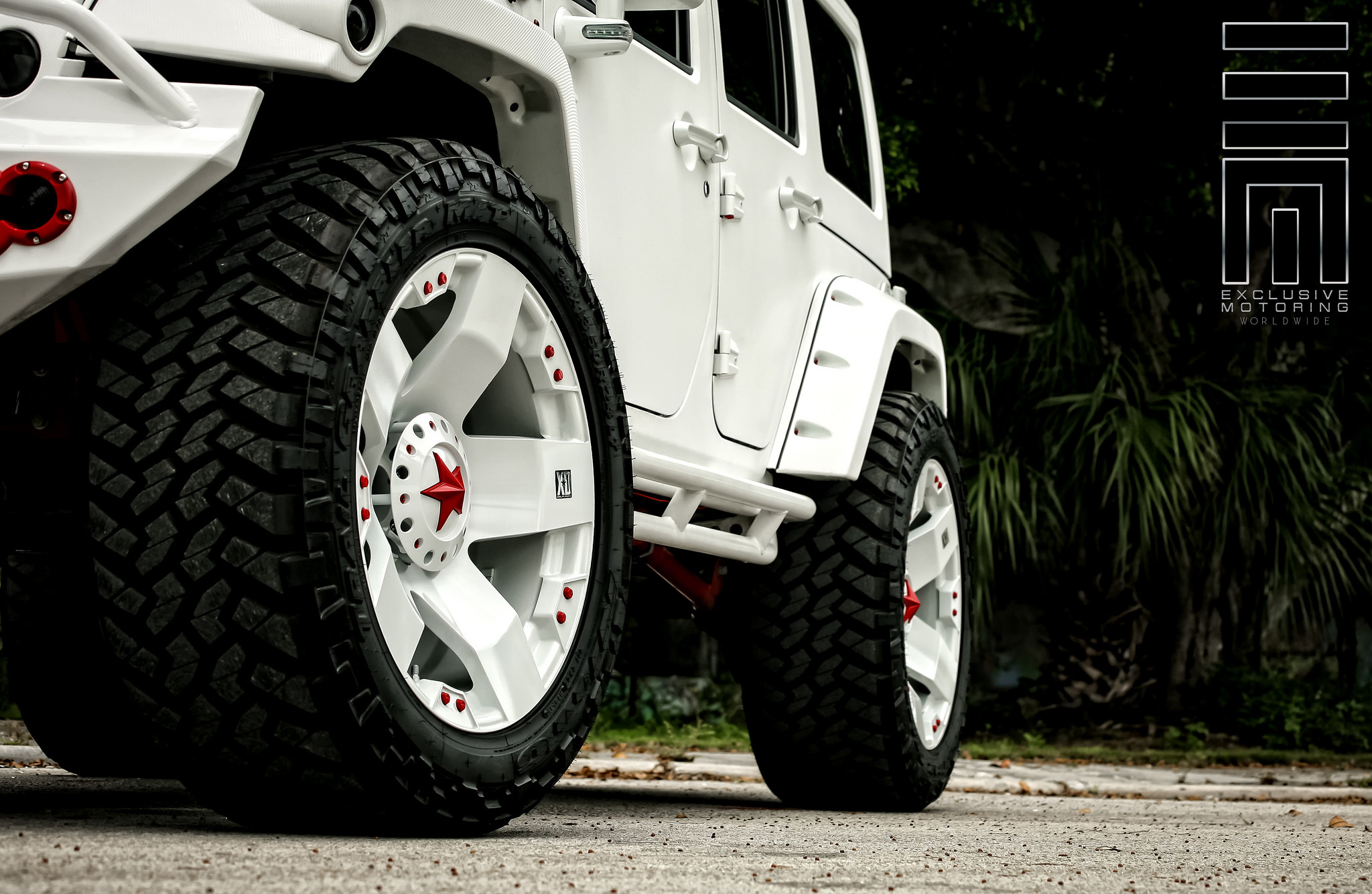 White XD Rims With Red Accents - Photo by Exclusive Motoring