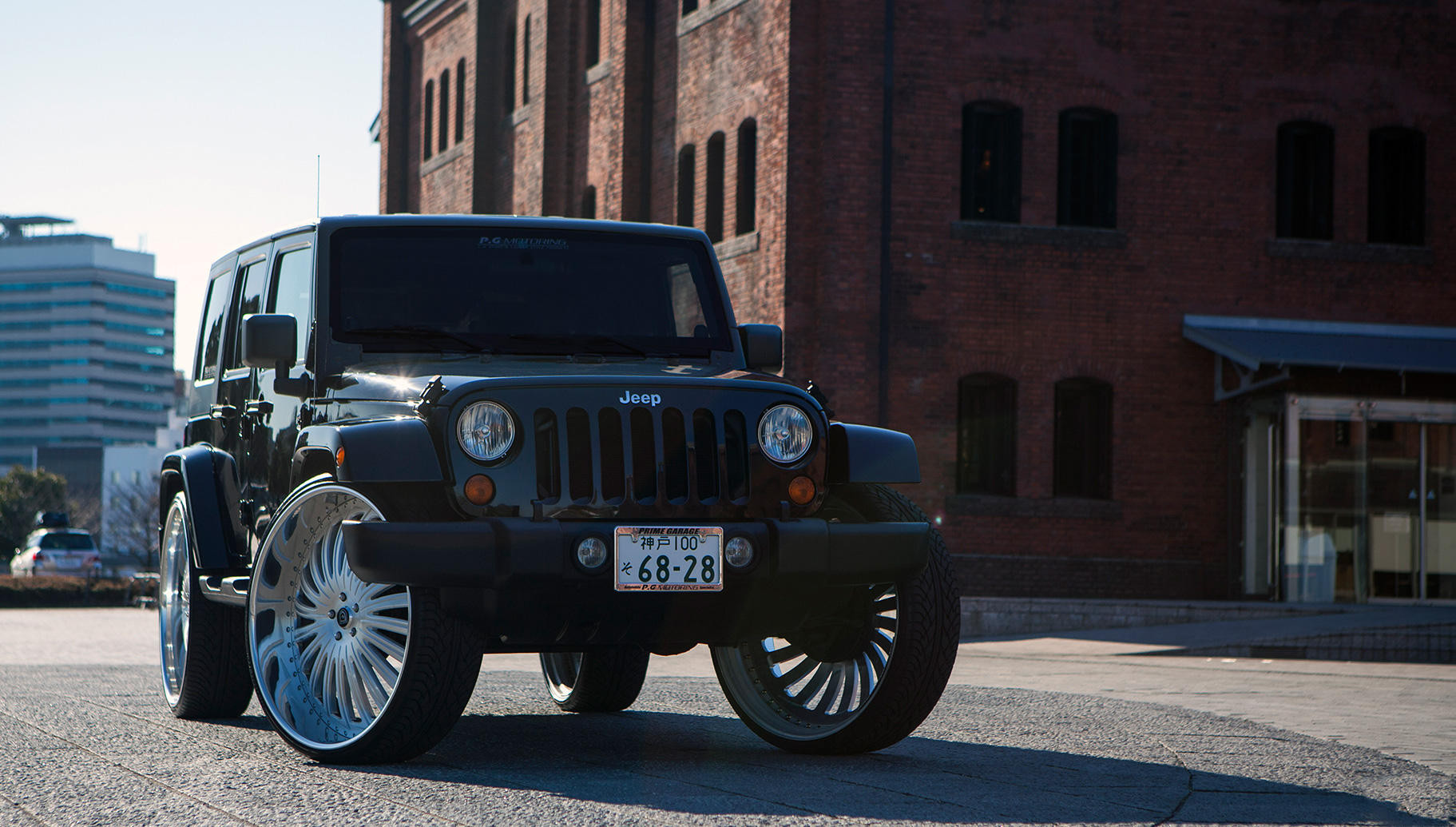 Jeep Wrangler Unlimited on Large Brushed Lexani Wheels - Photo by Lexani