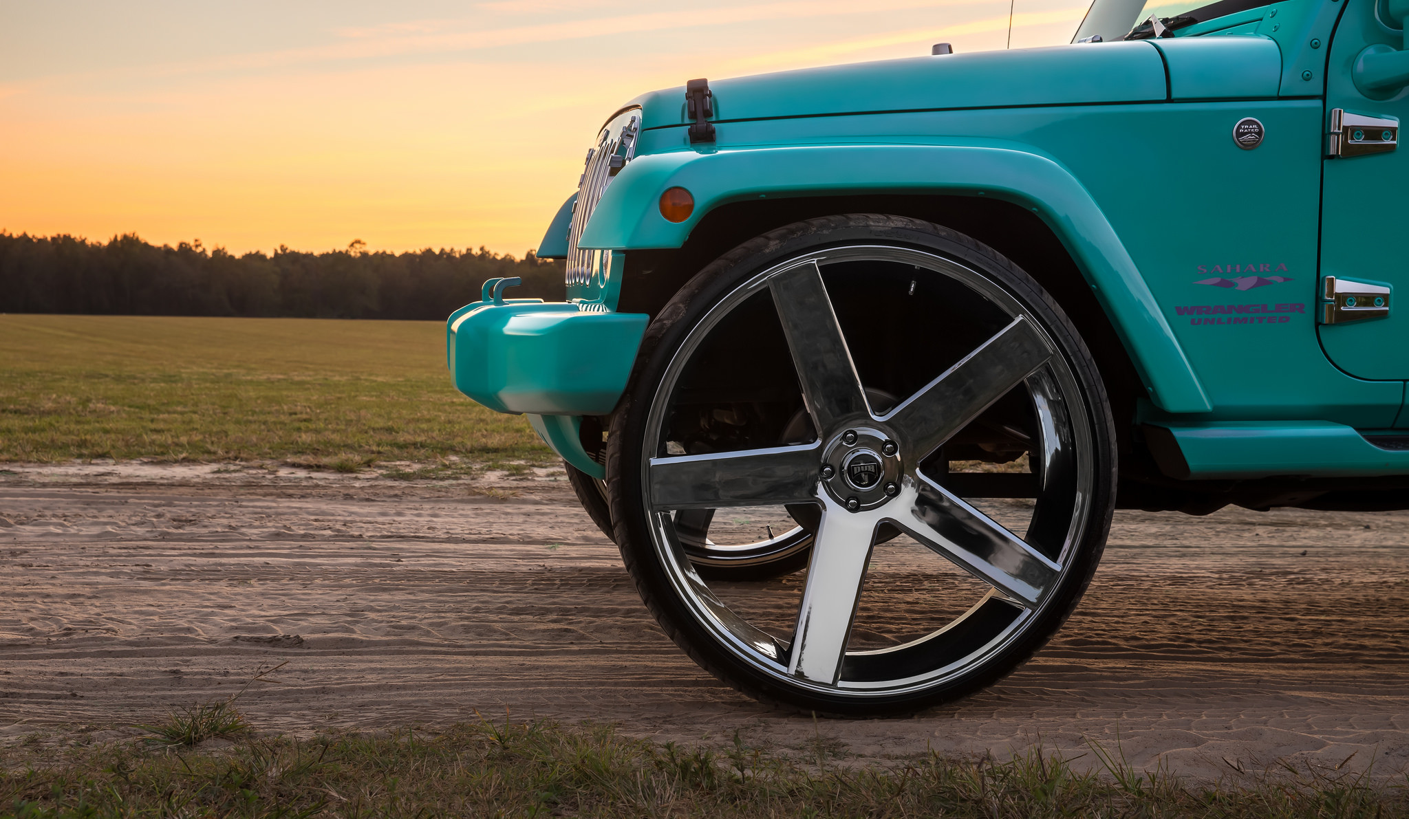 Custom Chrome DUB Baller Rims on Jeep Wrangler - Photo by DUB