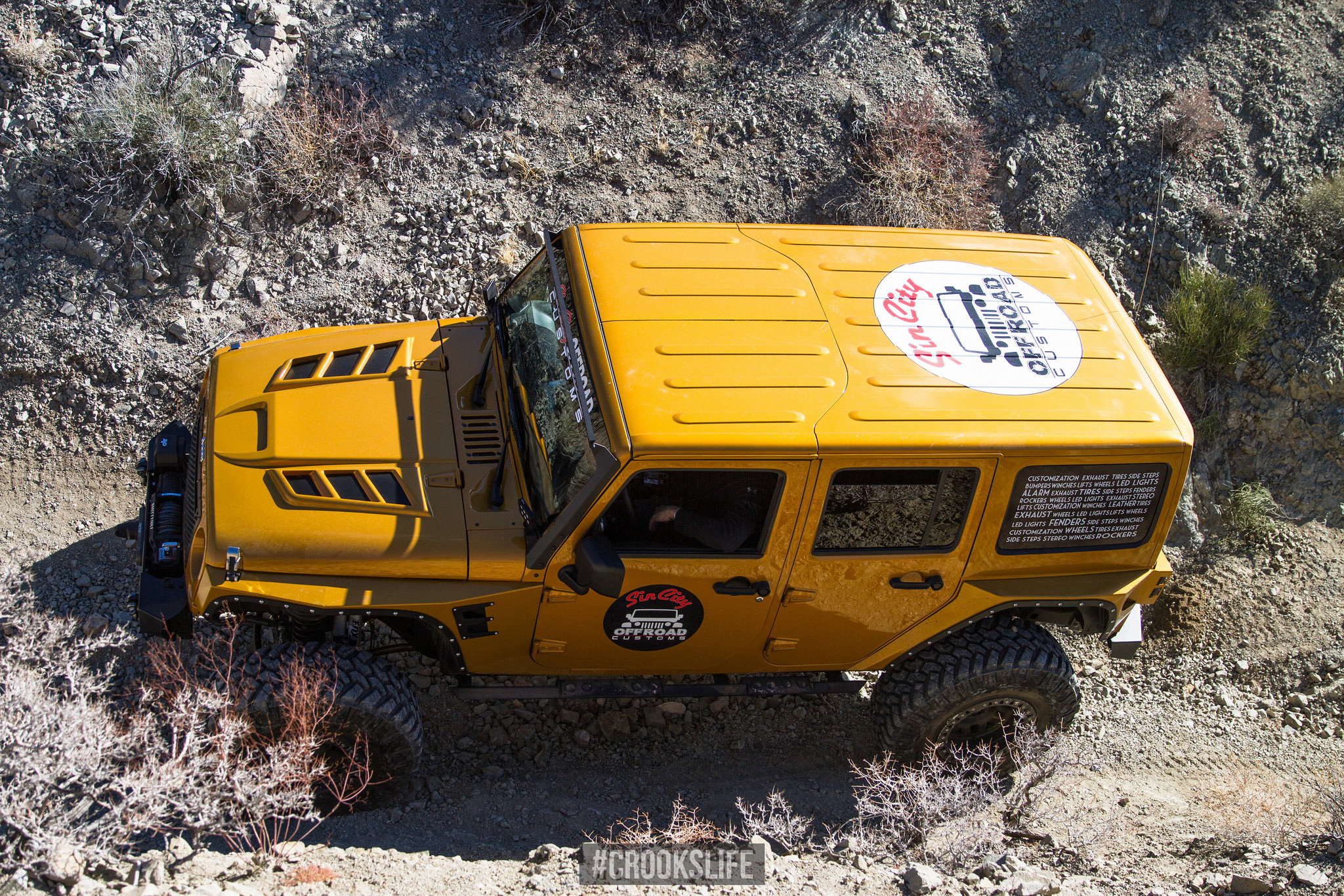 Aftermarket Hood on Yellow Jeep Wrangler - Photo by Jimmy Crook