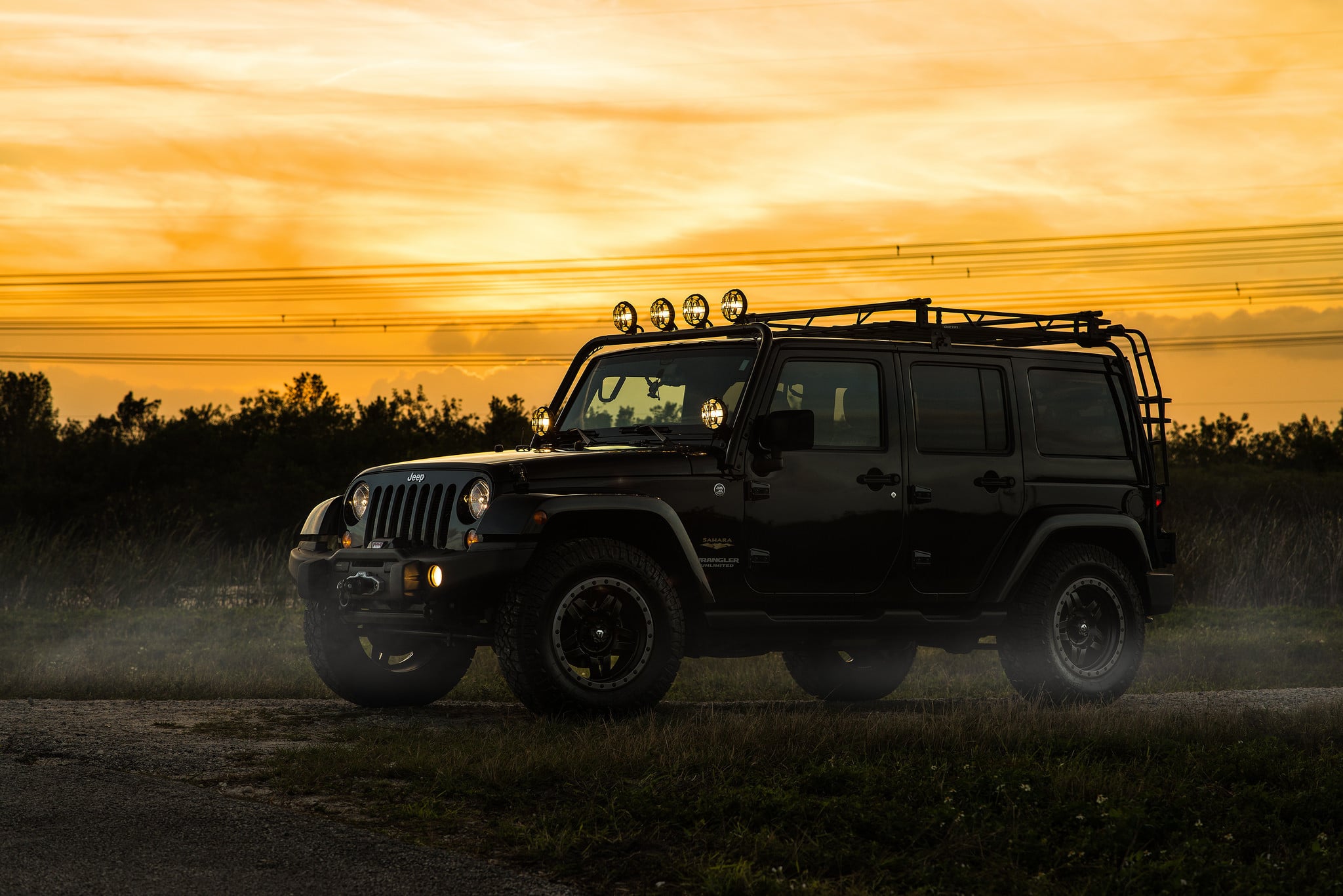 KC HiLiTes Lights on Black Jeep Wrangler - Photo by Fuel Offroad
