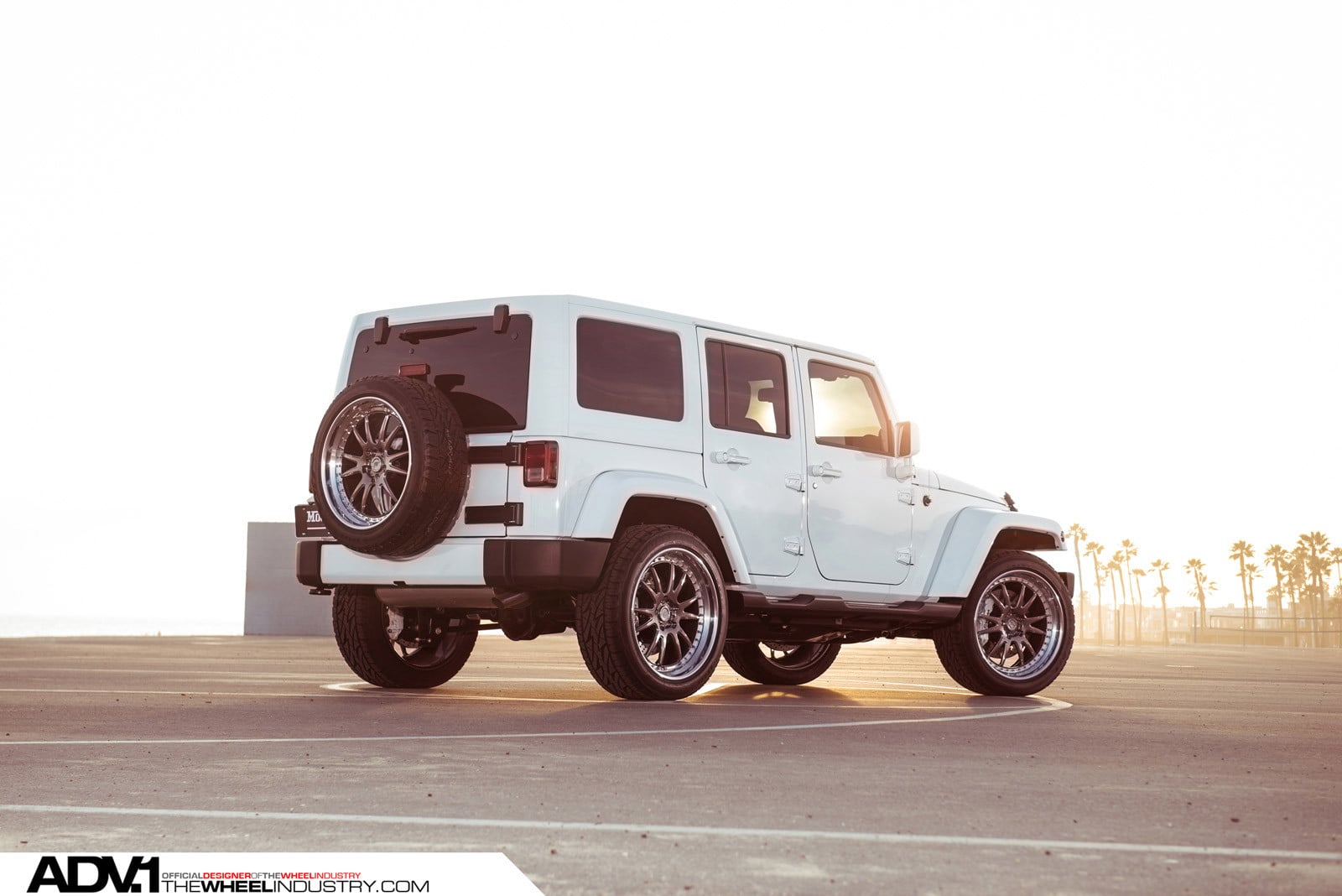Spare Tire Kit on White Jeep Wrangler - Photo by ADV.1