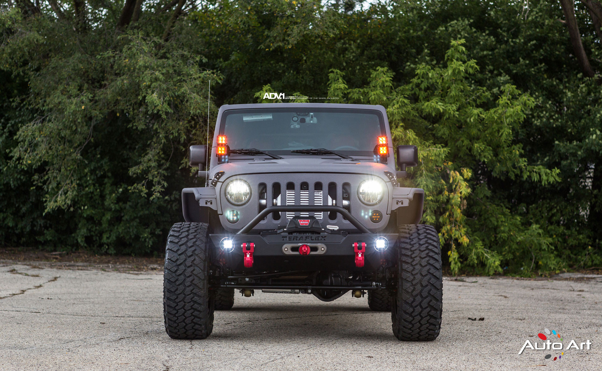 Aftermarket Headlights on Gray Jeep Wrangler - Photo by ADV.1