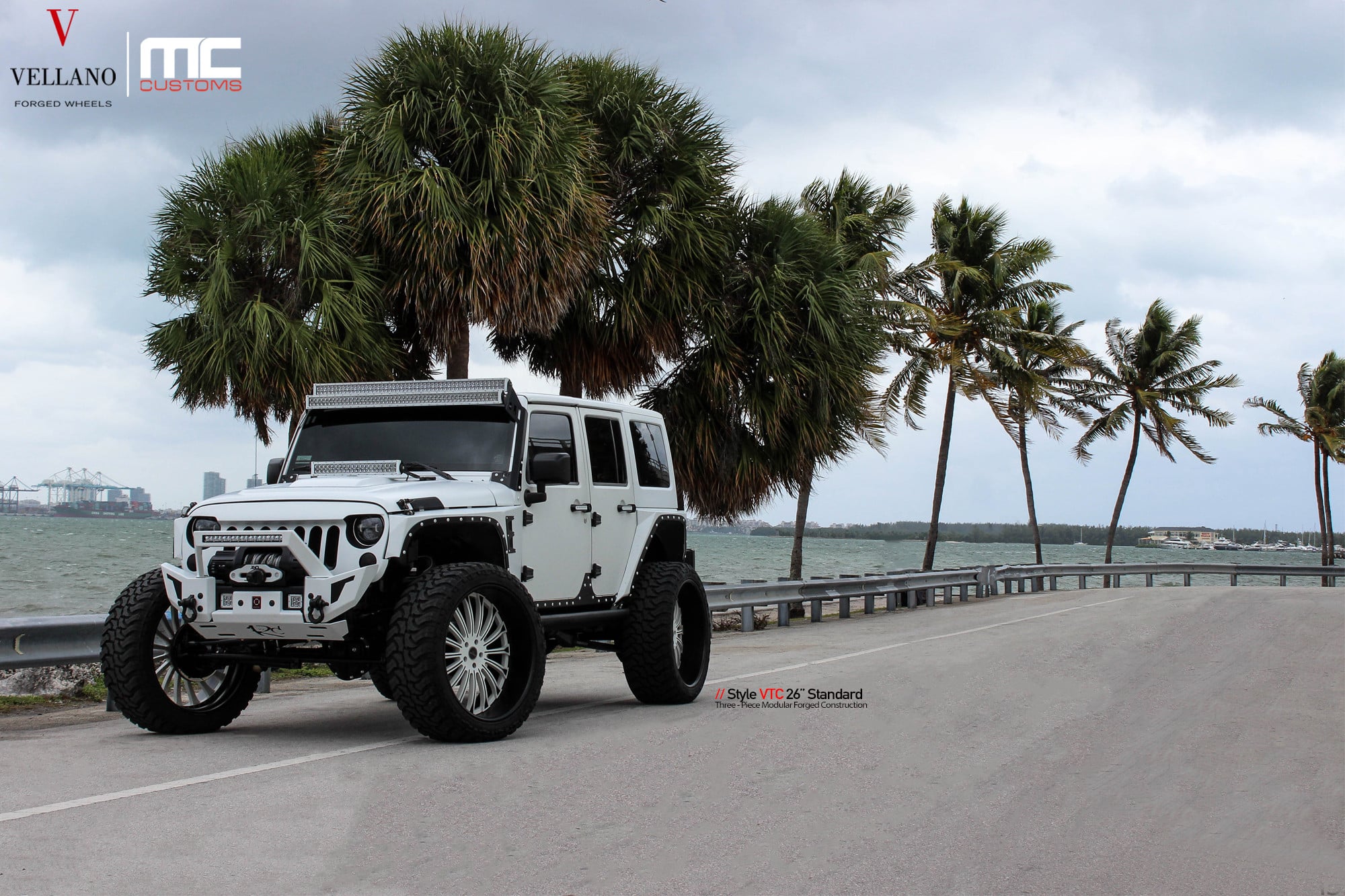 Aftermarket Dual LED Bars on White Jeep Wrangler - Photo by Vellano