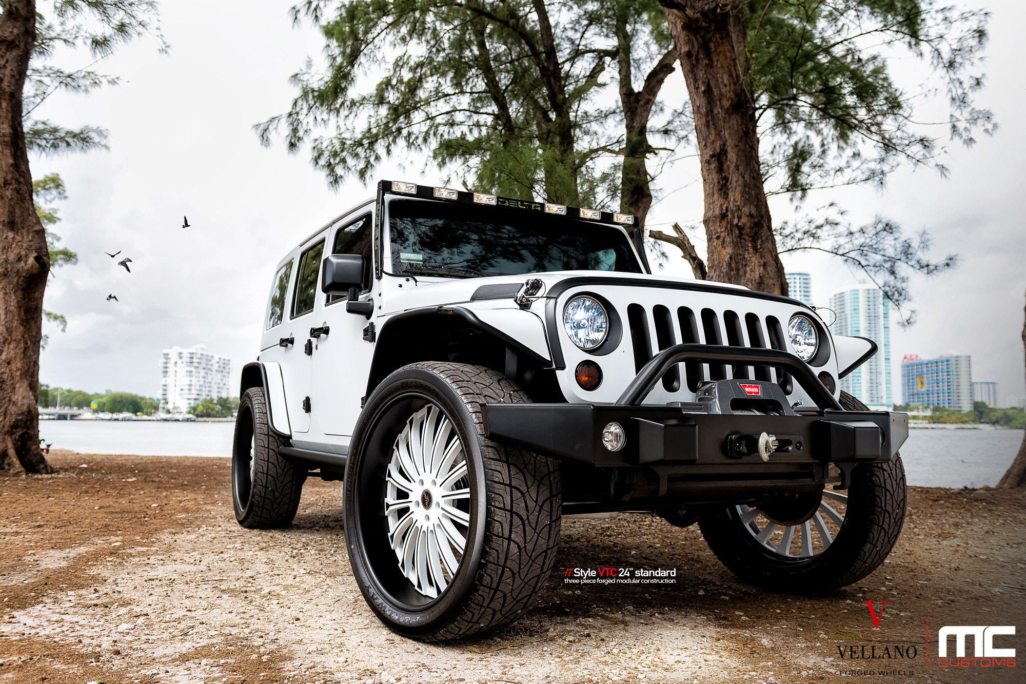 White Jeep Wrangler with Warn Off-Road Winch Bumper - Photo by Vellano