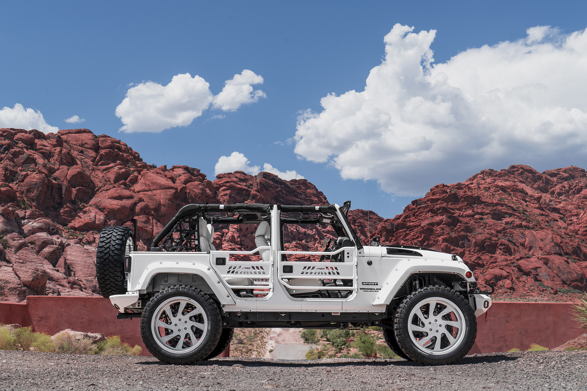 Aftermarket Fender Flares on White Jeep Wrangler Unlimited - Photo by Forgiato