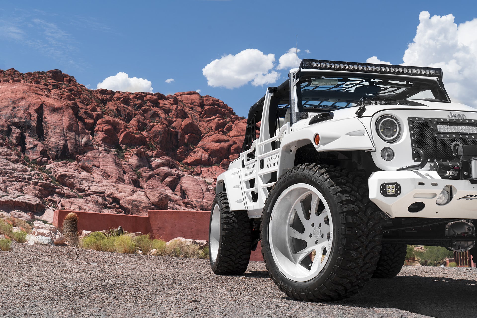 Mesh Grille with LED Light Bar on White Jeep Wrangler - Photo by Forgiato