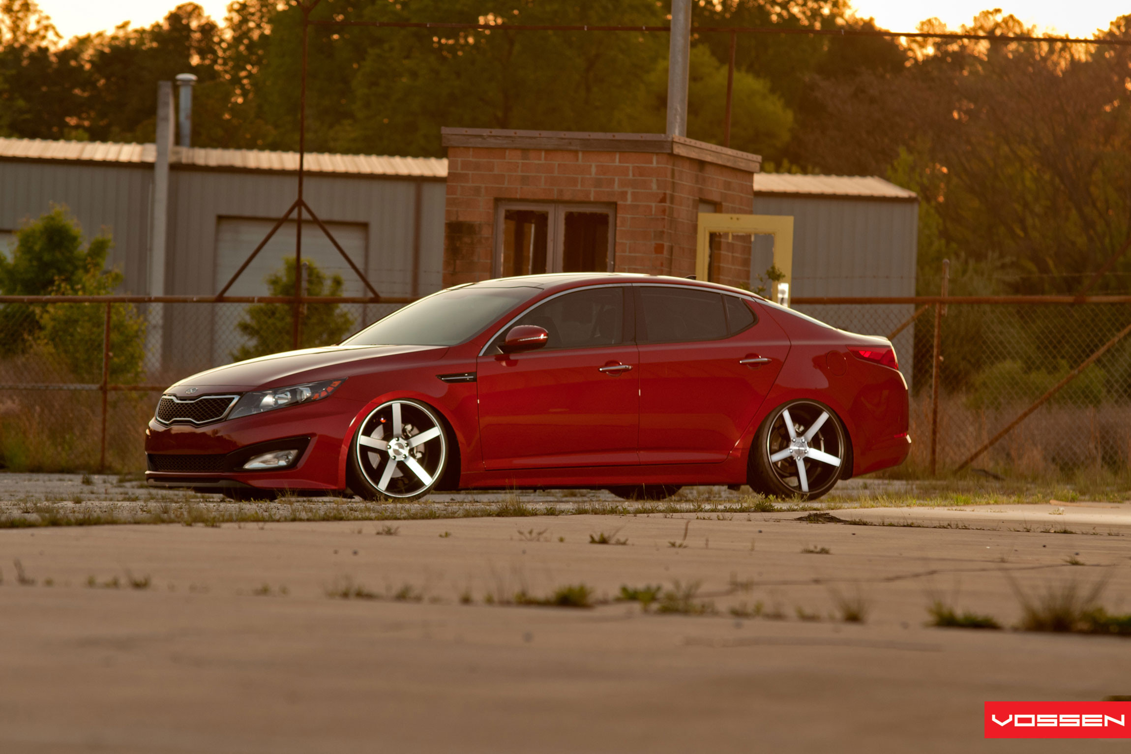 Chrome Vossen Wheels on Red Kia Optima - Photo by Vossen