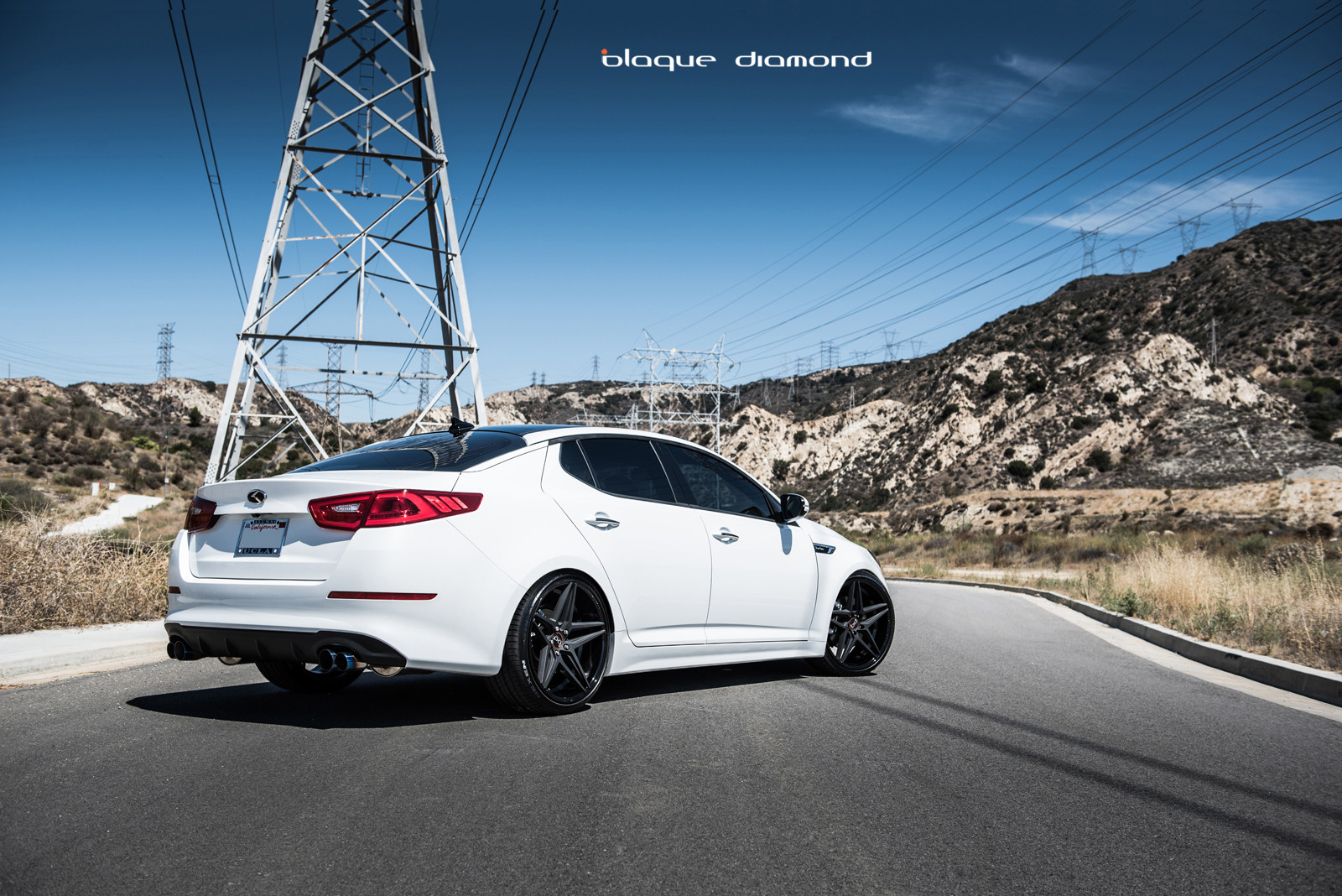White Kia Optima with Aftermarket Rear Diffuser - Photo by Blaque Diamond
