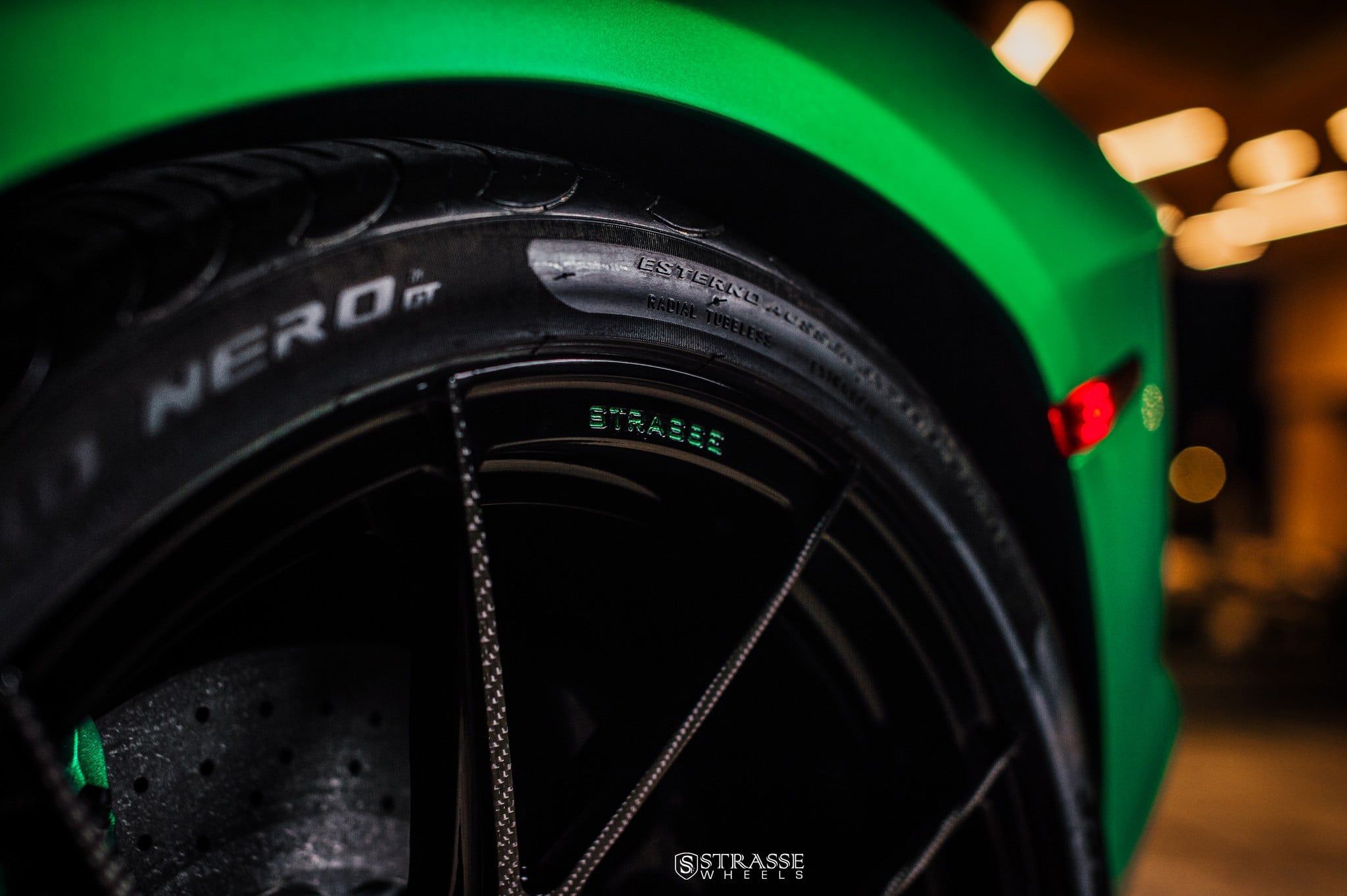 Carbon Fiber Strasse Rims on Green Lamborghini Aventador - Photo by Strasse Forged
