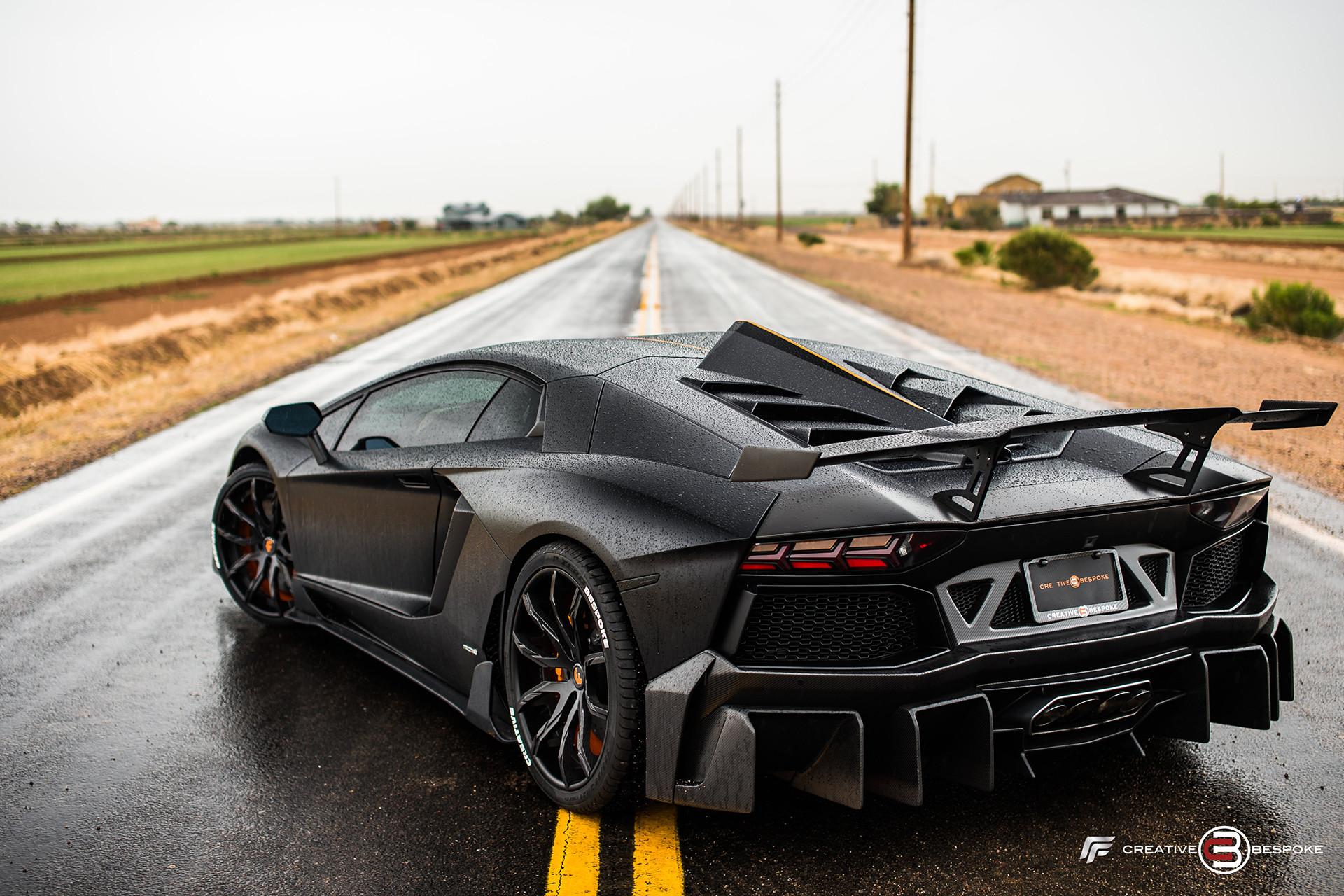 Aftermarket Rear Diffuser on Black Lamborghini Aventador - Photo by Forgiato