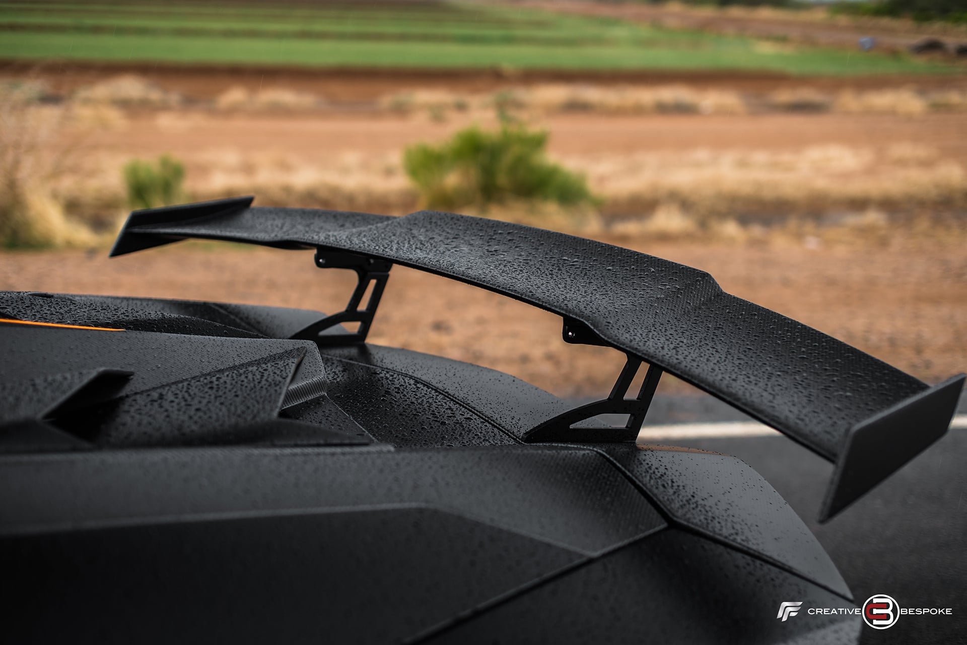 Black Lamborghini Aventador with Carbon Fiber Wing Spoiler - Photo by Forgiato